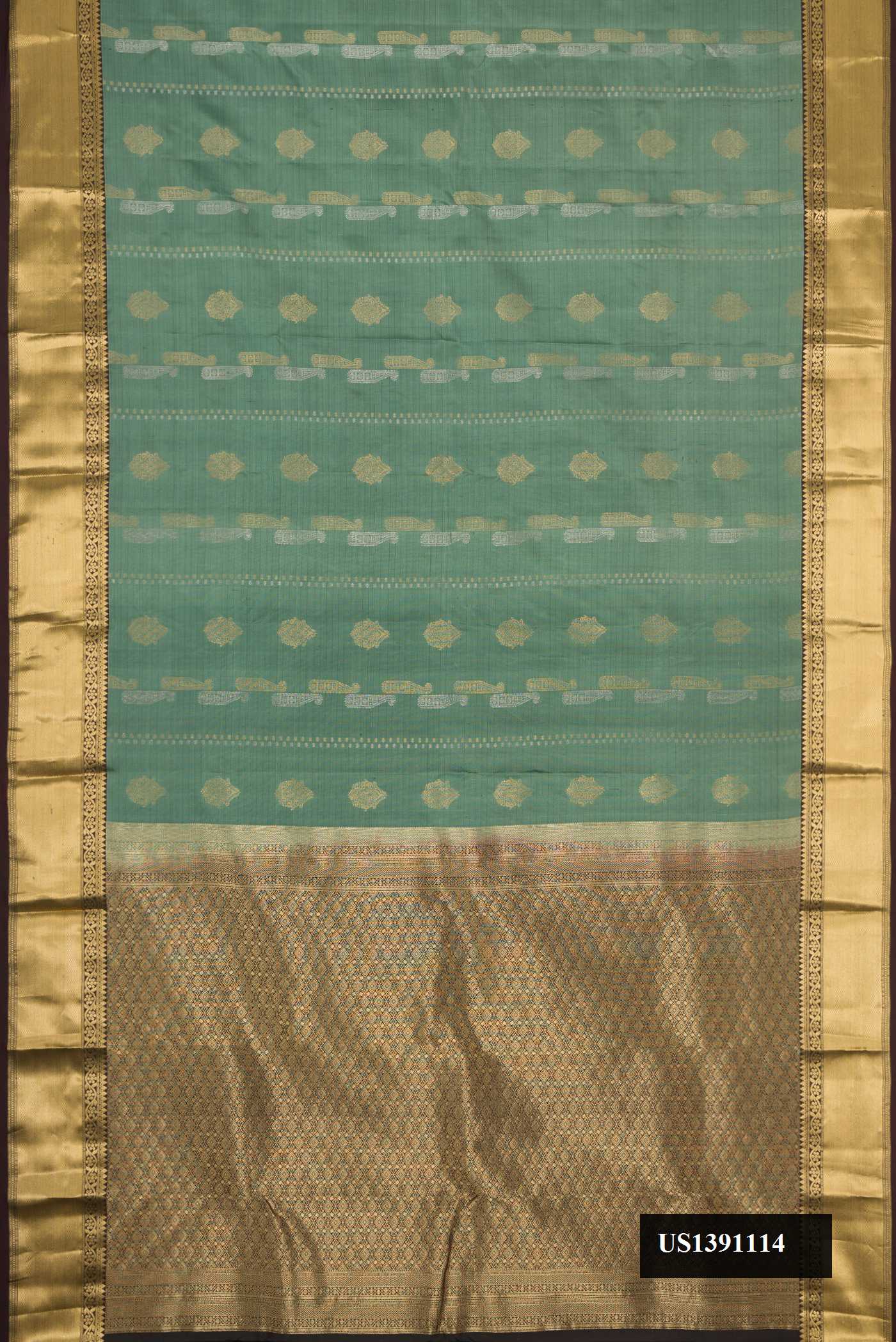 Green Dual Tone Kanchipuram Silk Saree with Stripes on the body and Zari Border.  displayed on a mannequin