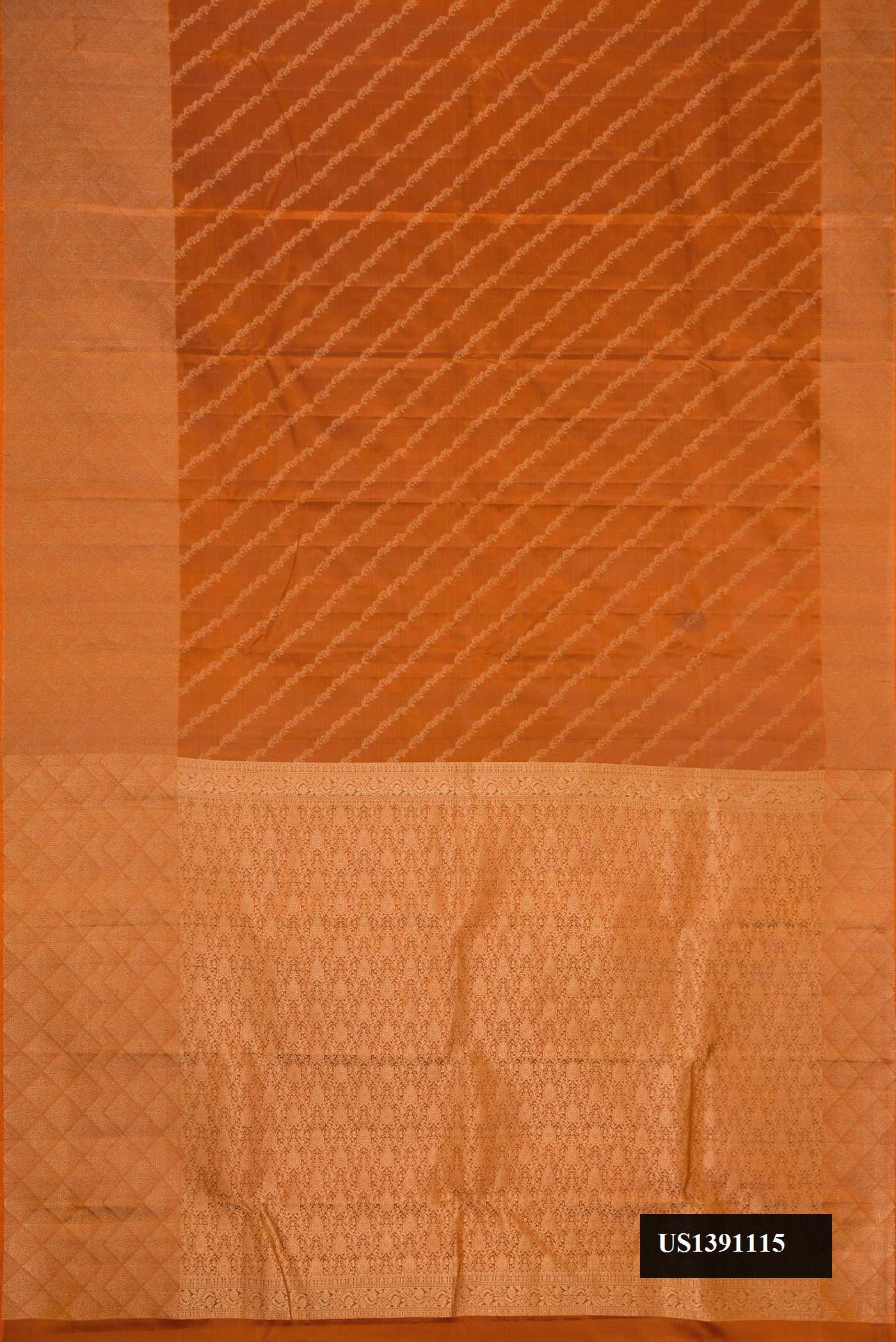 Brick Orange Dual Tone Kanchipuram Silk Saree with Zari Butta on the body and Zari Border.  displayed on a mannequin