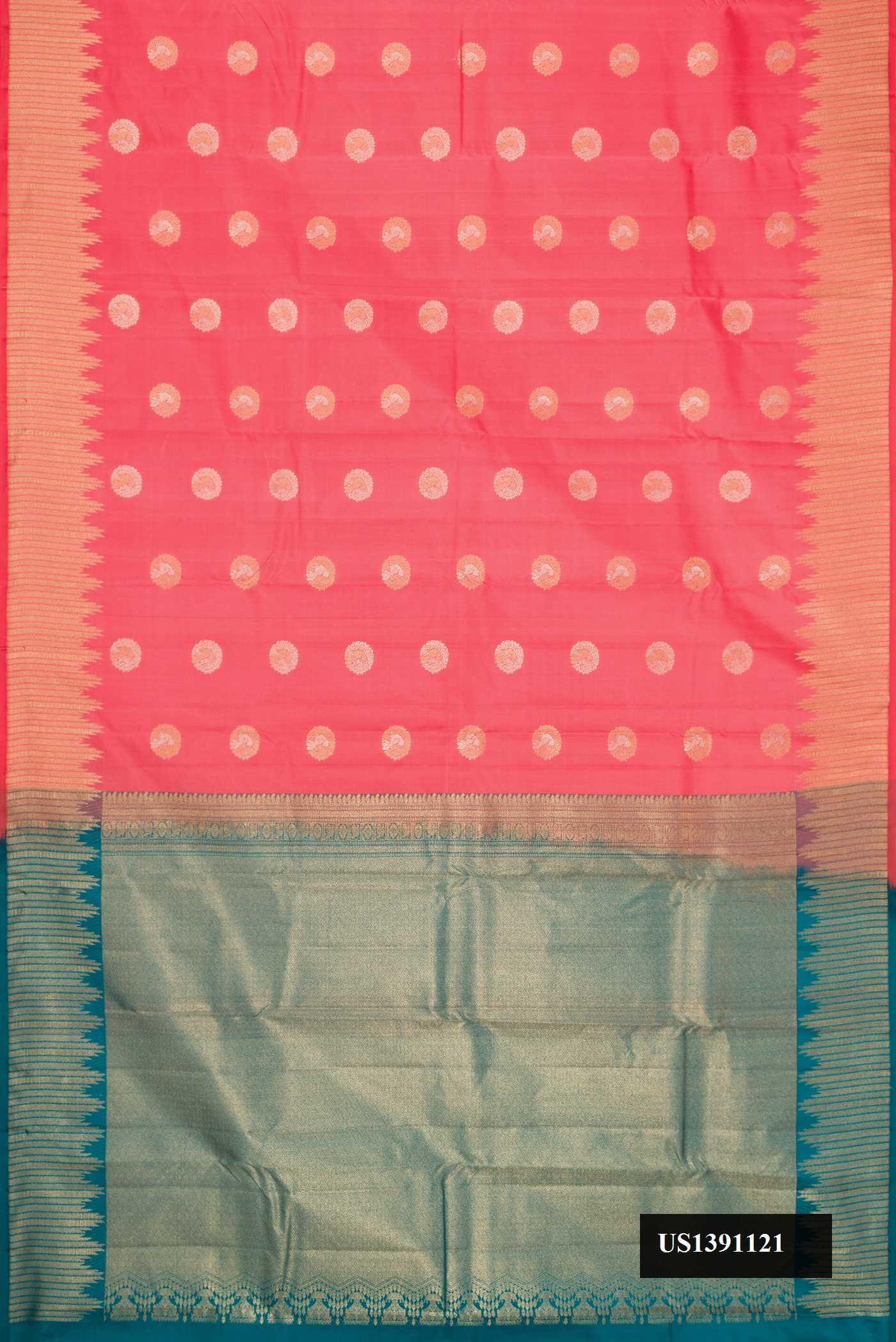 Coral Dual Tone Kanchipuram Silk Saree with Zari Butta on the body and Zari Border.  displayed on a mannequin