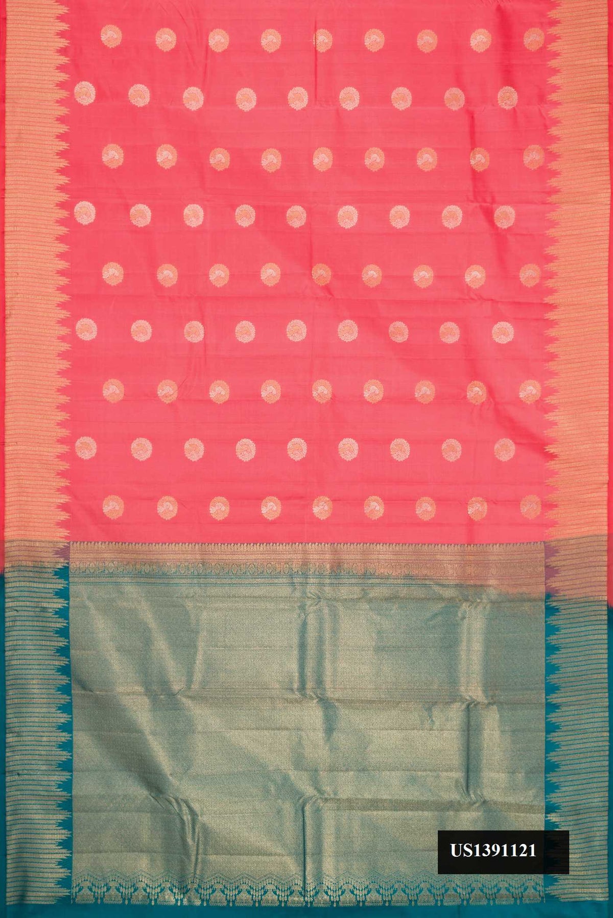 Coral Dual Tone Kanchipuram Silk Saree with Zari Butta on the body and Zari Border.  displayed on a mannequin