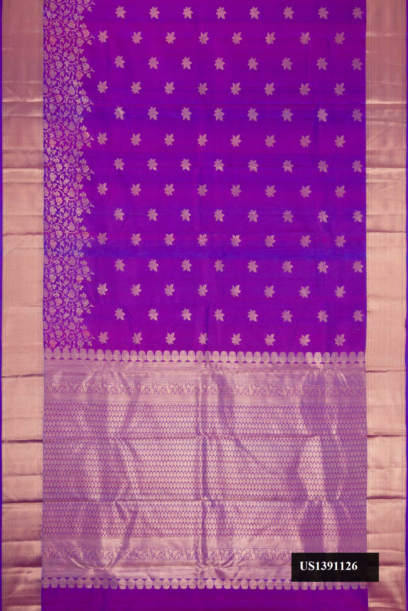 Purple Dual Tone Kanchipuram Silk Saree with Zari Butta on the body and Fancy Border.  displayed on a mannequin