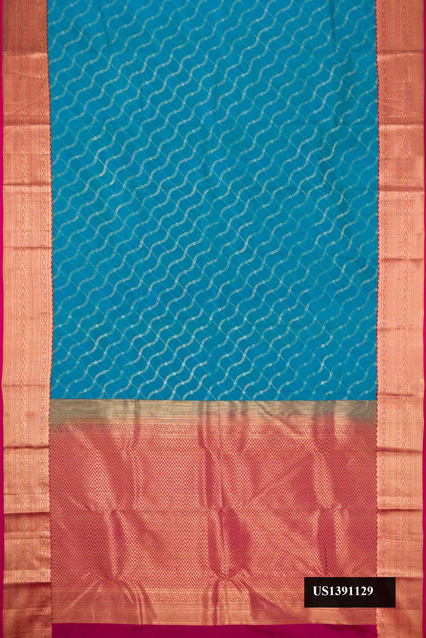 Peacock Blue Dual Tone Kanchipuram Silk Saree with Zari Brocade on the body and Zari Border.  displayed on a mannequin