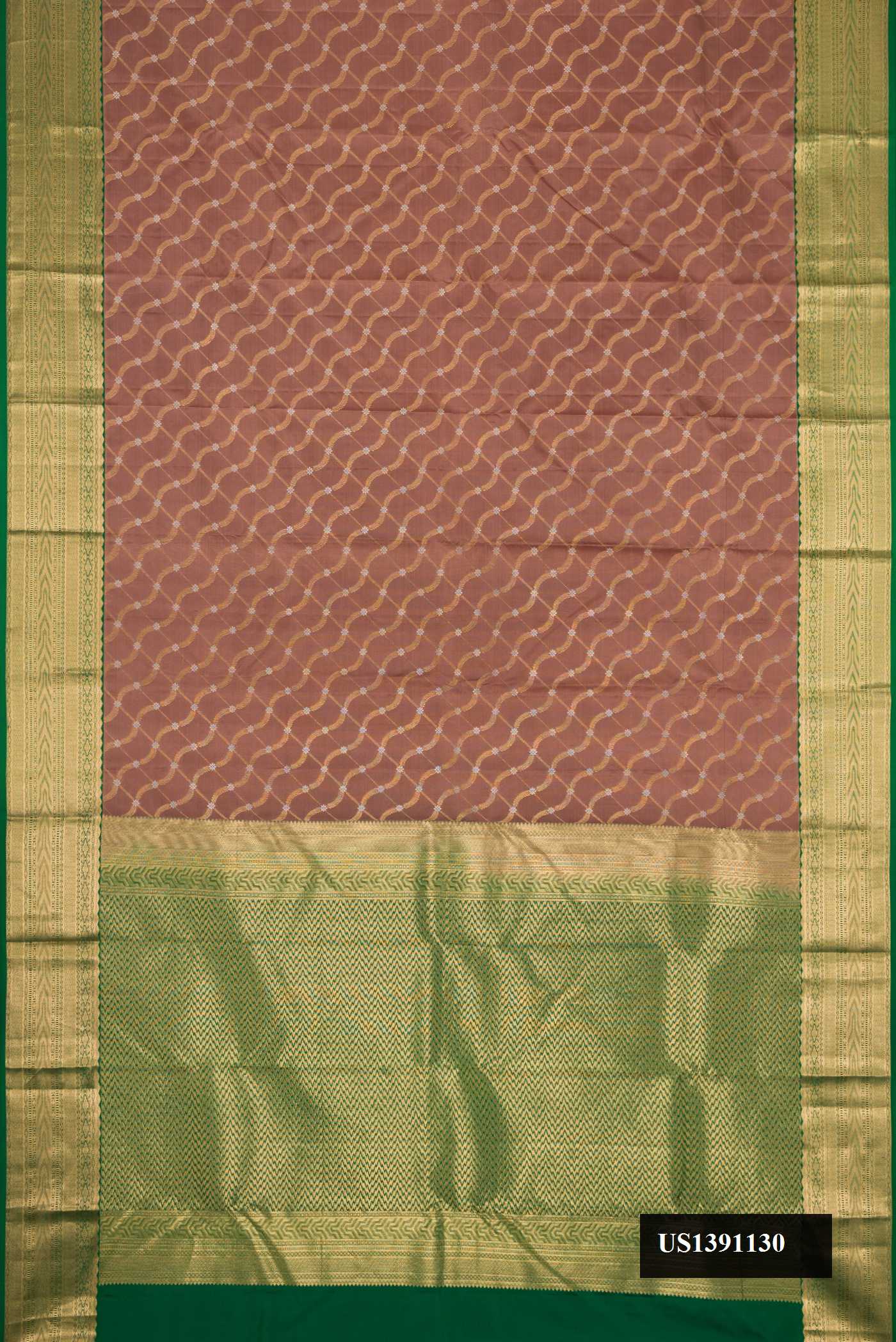Brown Dual Tone Kanchipuram Silk Saree with Zari Brocade on the body and Zari Border.  displayed on a mannequin