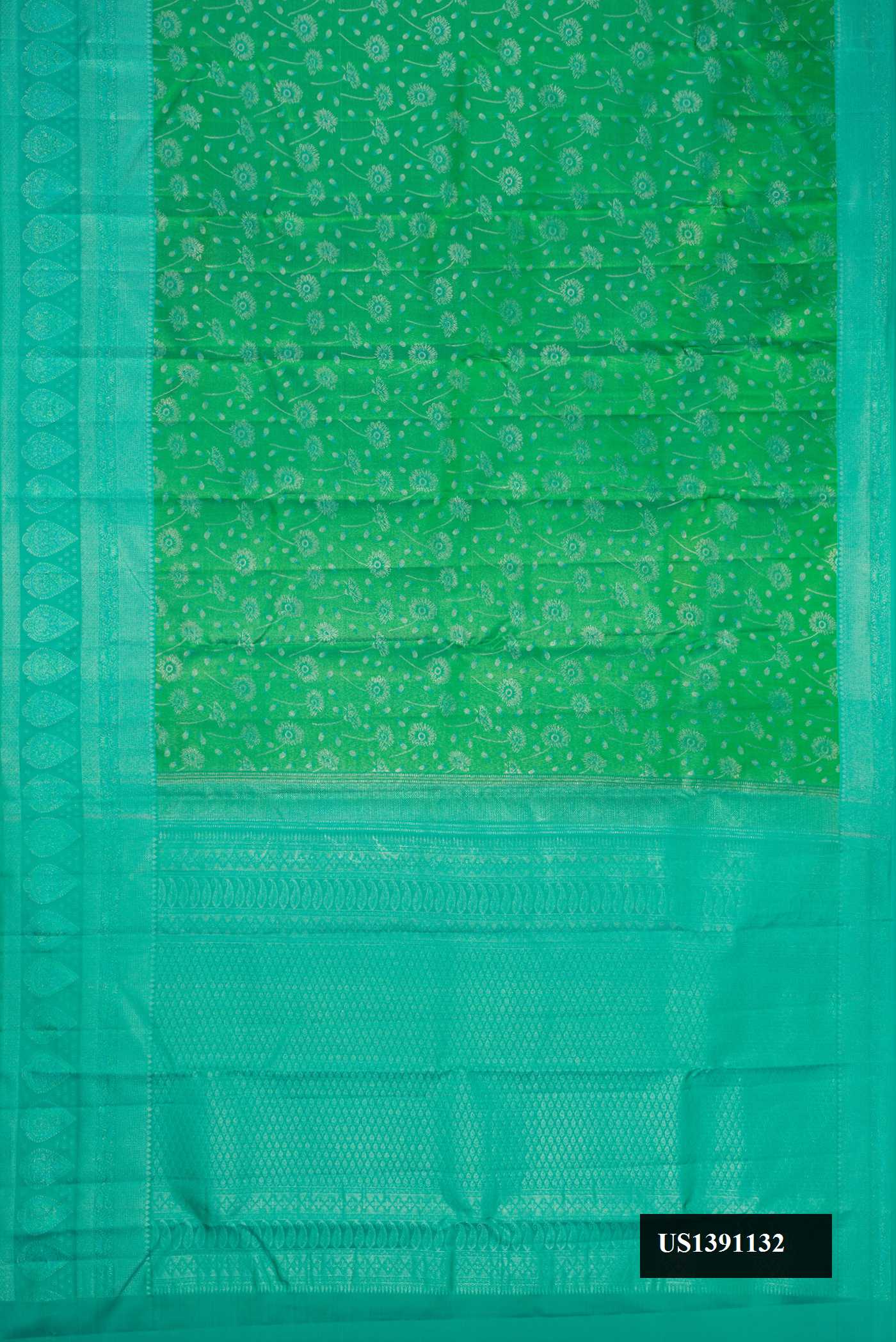 Green Dual Tone Kanchipuram Silk Saree with Zari Brocade on the body and Fancy Border.  displayed on a mannequin