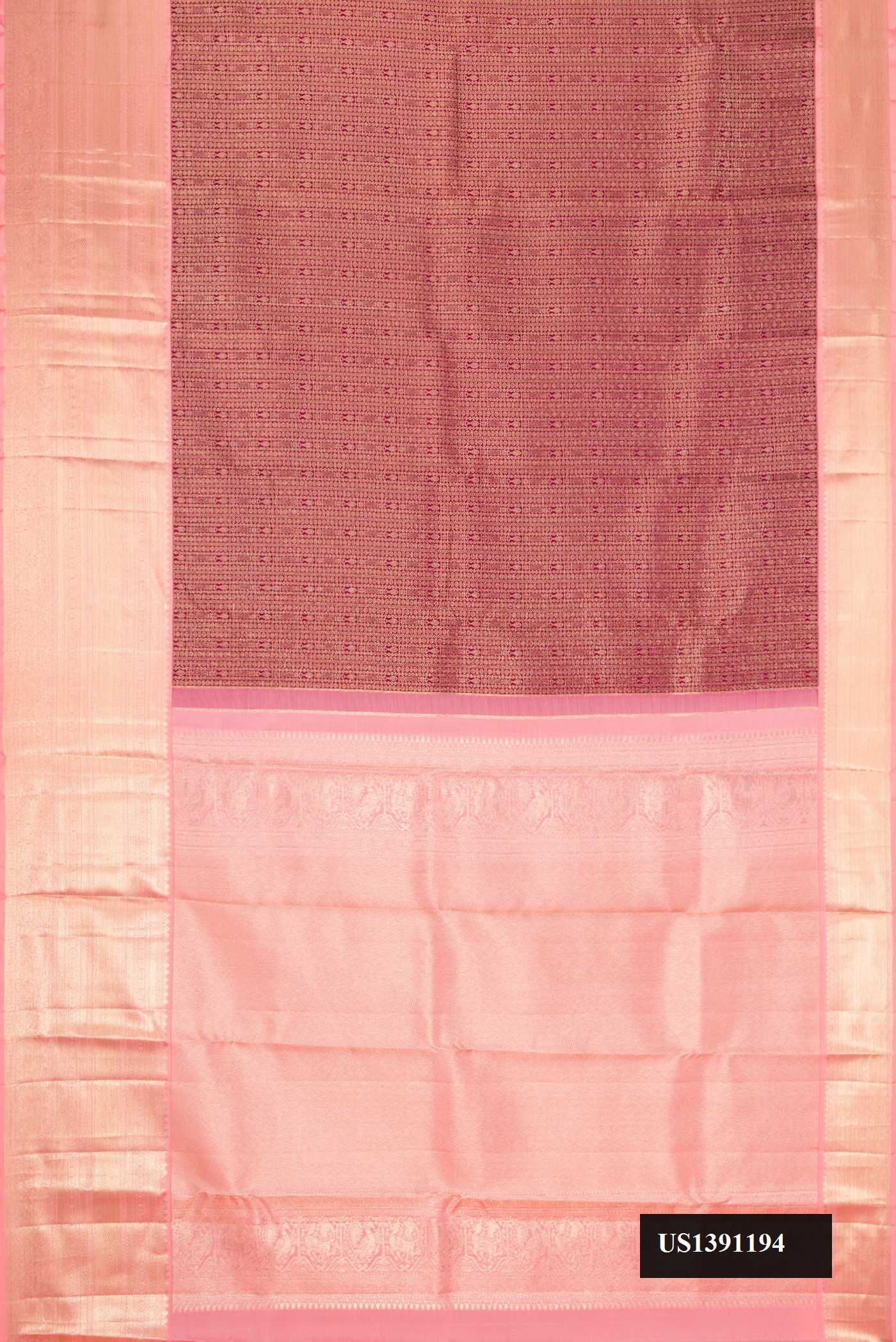 Maroon Dual Tone Kanchipuram Silk Saree with Zari Brocade on the body and Zari Border.  displayed on a mannequin