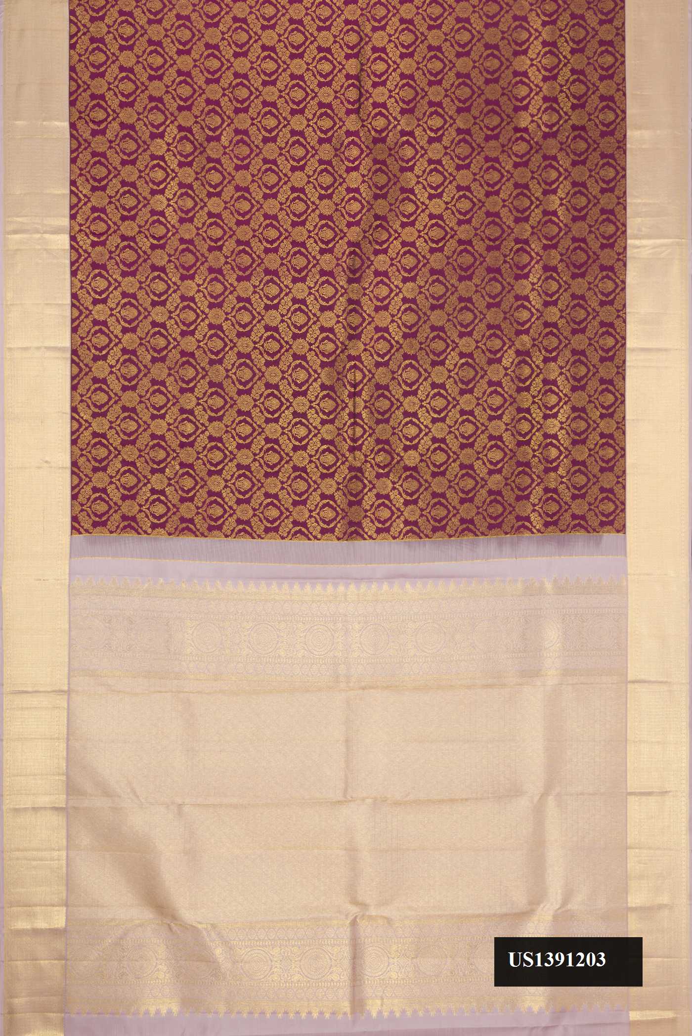 Burgundy Dual Tone Kanchipuram Silk Saree with Zari Brocade on the body and Zari Border.  displayed on a mannequin
