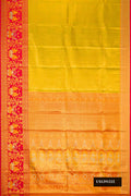 Gold Dual Tone Kanchipuram Tissue Silk Saree with Zari Brocade on the body and Fancy Border.  displayed on a mannequin