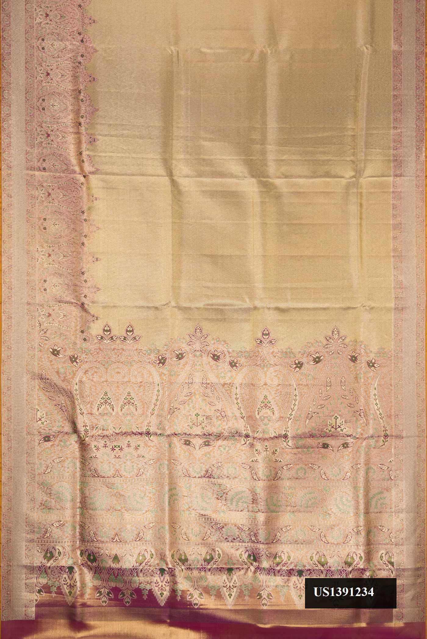 Gold Dual Tone Kanchipuram Tissue Silk Saree with Zari Brocade on the body and Fancy Border.  displayed on a mannequin