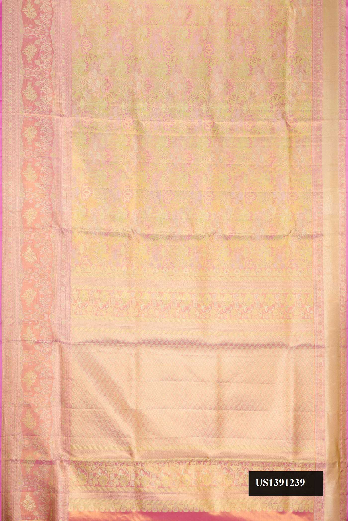 Pista Green Dual Tone Kanchipuram Tissue Silk Saree with Zari Brocade on the body and Fancy Border.  displayed on a mannequin