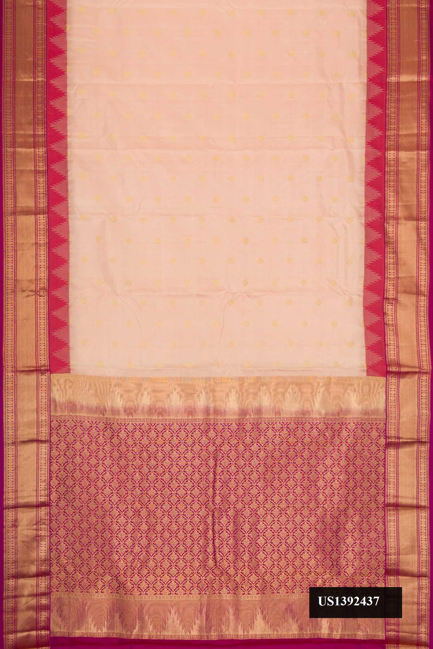Rose Gold Dual Tone Kanchipuram Silk Saree with Zari Butta on the body and Zari Border.  displayed on a mannequin
