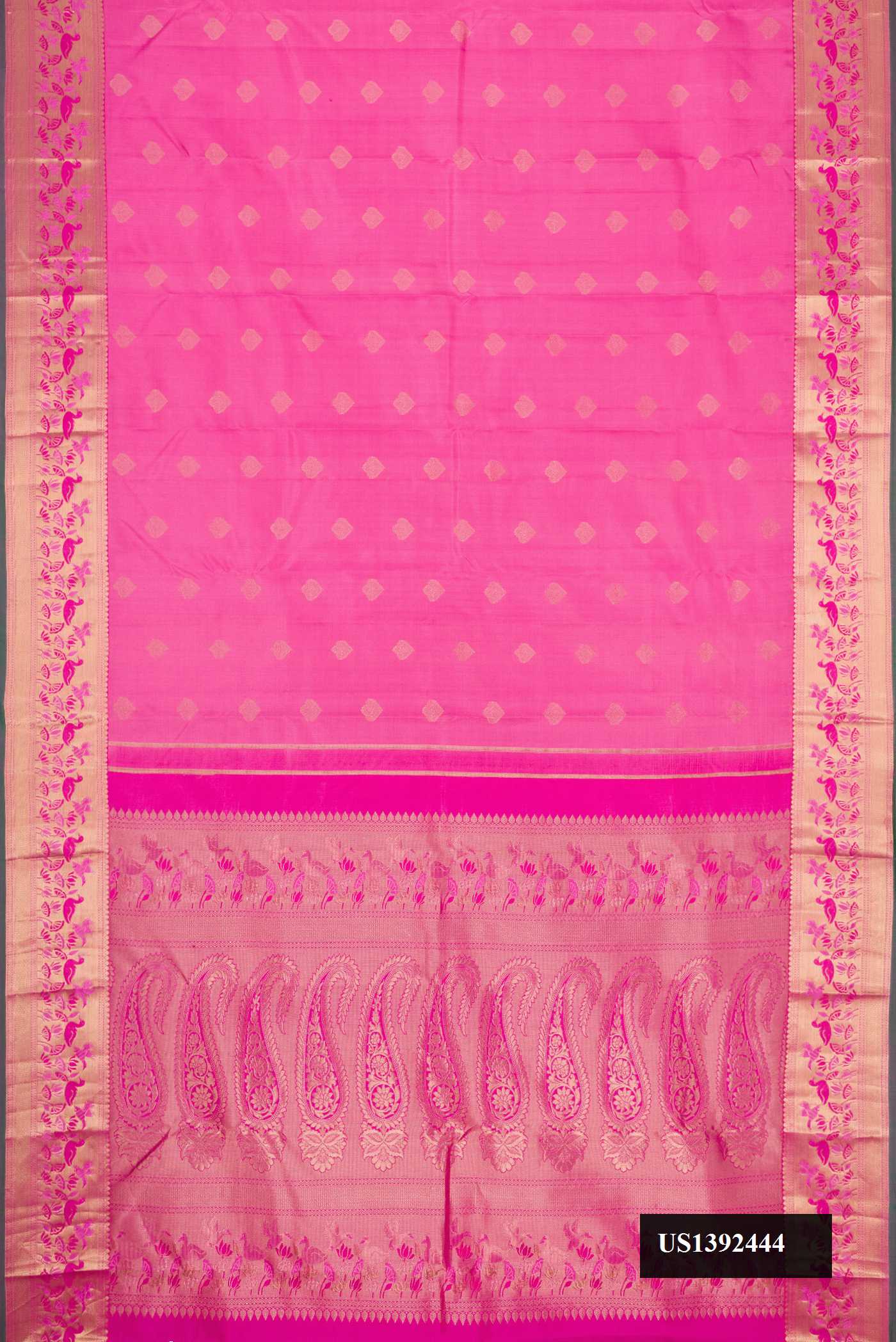Pink Dual Tone Kanchipuram Silk Saree with Zari Butta on the body and Zari Border.  displayed on a mannequin