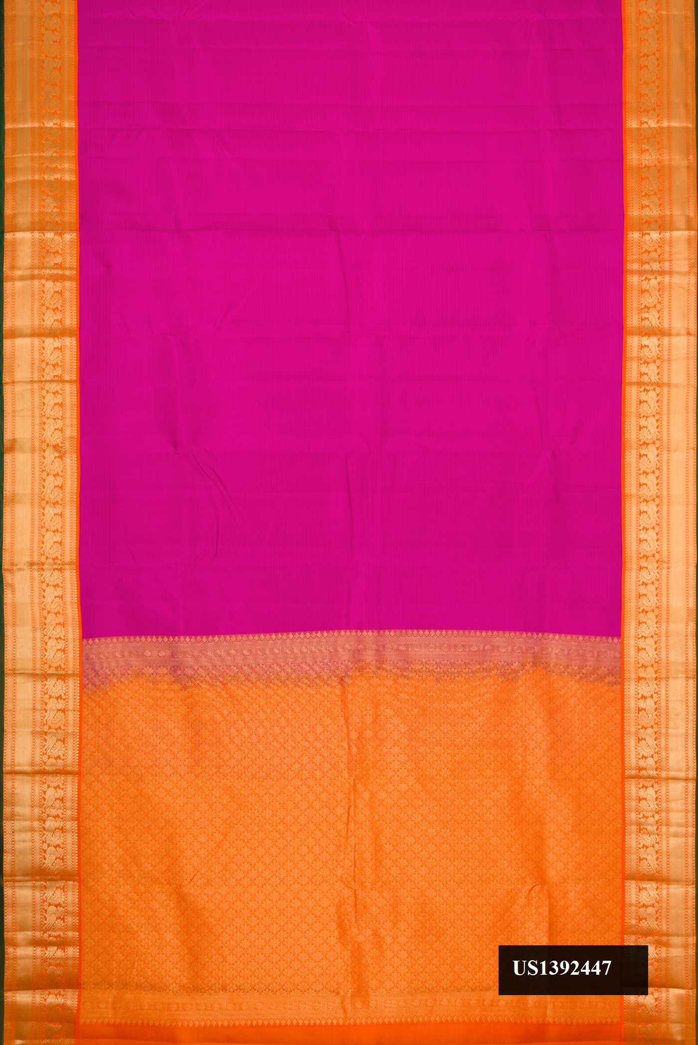 Magenta Dual Tone Kanchipuram Silk Saree with Stripes on the body and Zari Border.  displayed on a mannequin