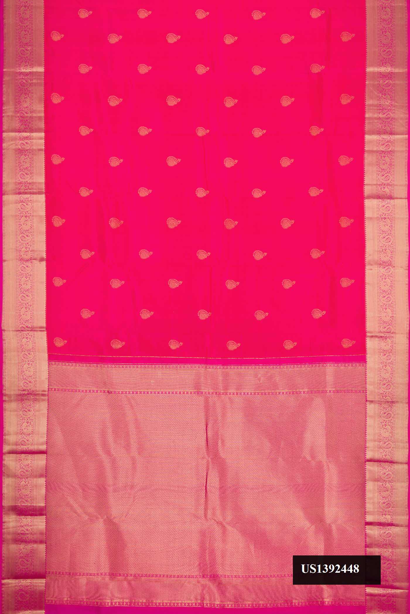 Pink Dual Tone Kanchipuram Silk Saree with Zari Butta on the body and Zari Border.  displayed on a mannequin