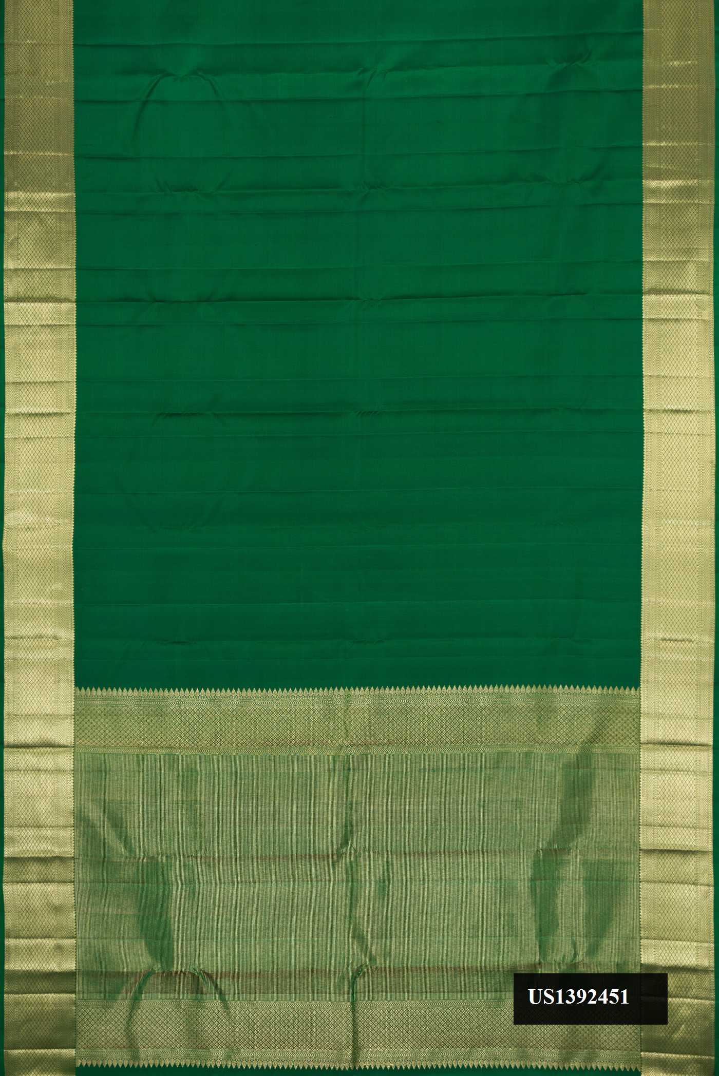 Bottle Green Dual Tone Kanchipuram Silk Saree with Plain Body and Zari Border.  displayed on a mannequin