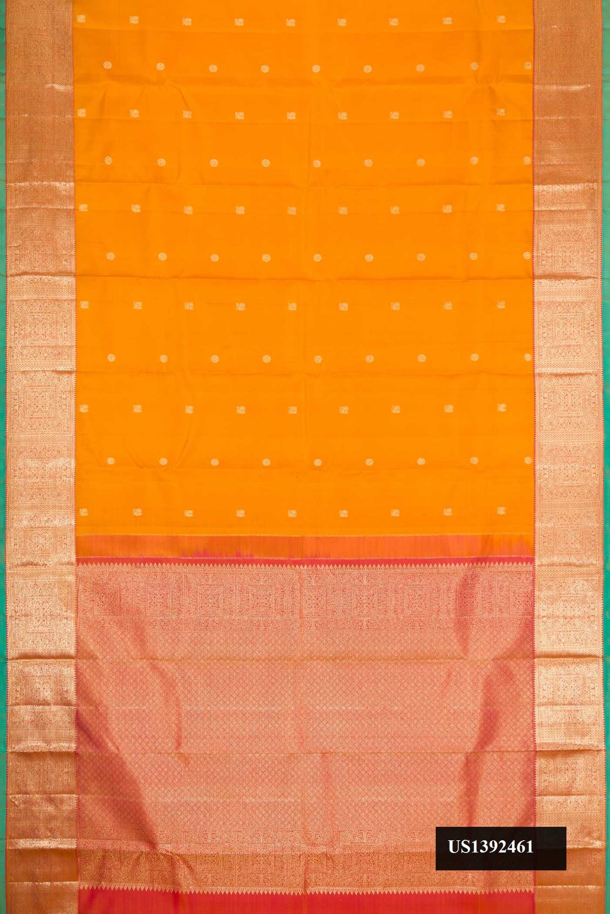 Mustard Dual Tone Kanchipuram Silk Saree with Zari Butta on the body and Zari Border.  displayed on a mannequin