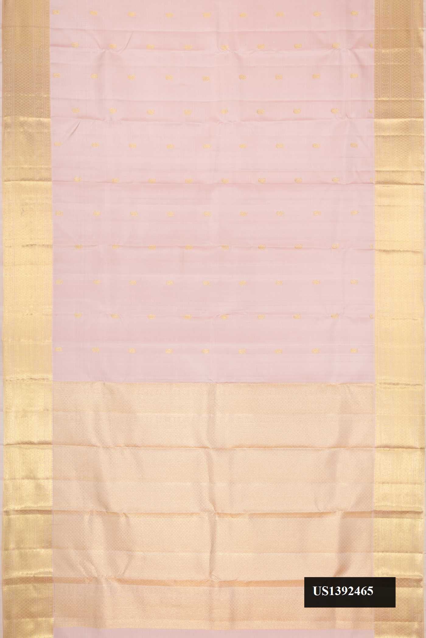 Rose pink Dual Tone Kanchipuram Silk Saree with Zari Butta on the body and Zari Border.  displayed on a mannequin