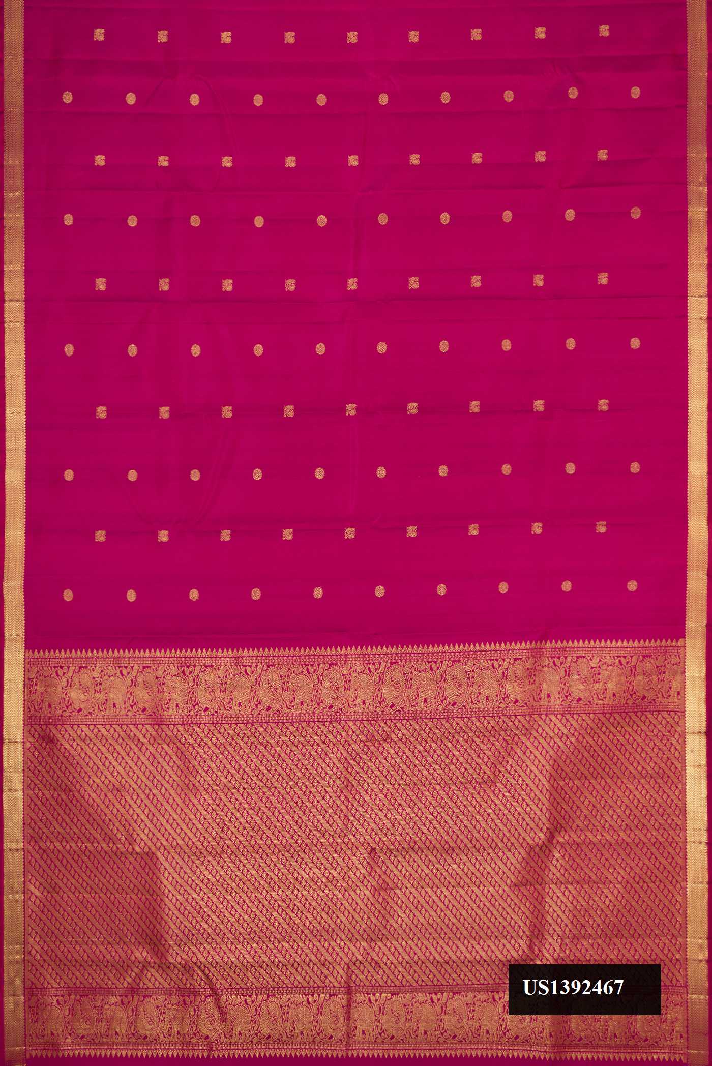 Magenta Dual Tone Kanchipuram Silk Saree with Zari Butta on the body and Zari Border.  displayed on a mannequin