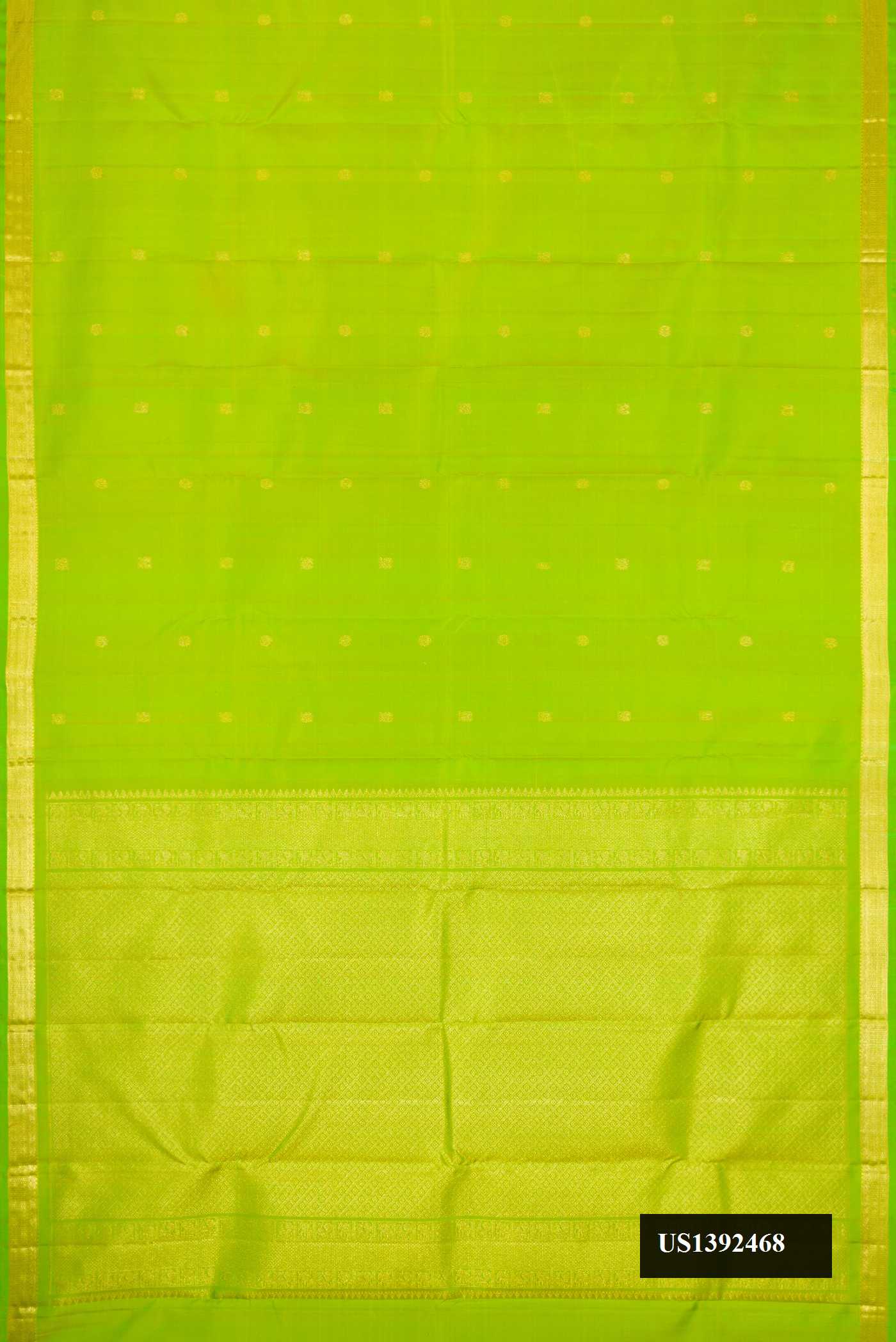 Parrot Green Dual Tone Kanchipuram Silk Saree with Zari Butta on the body and Zari Border.  displayed on a mannequin