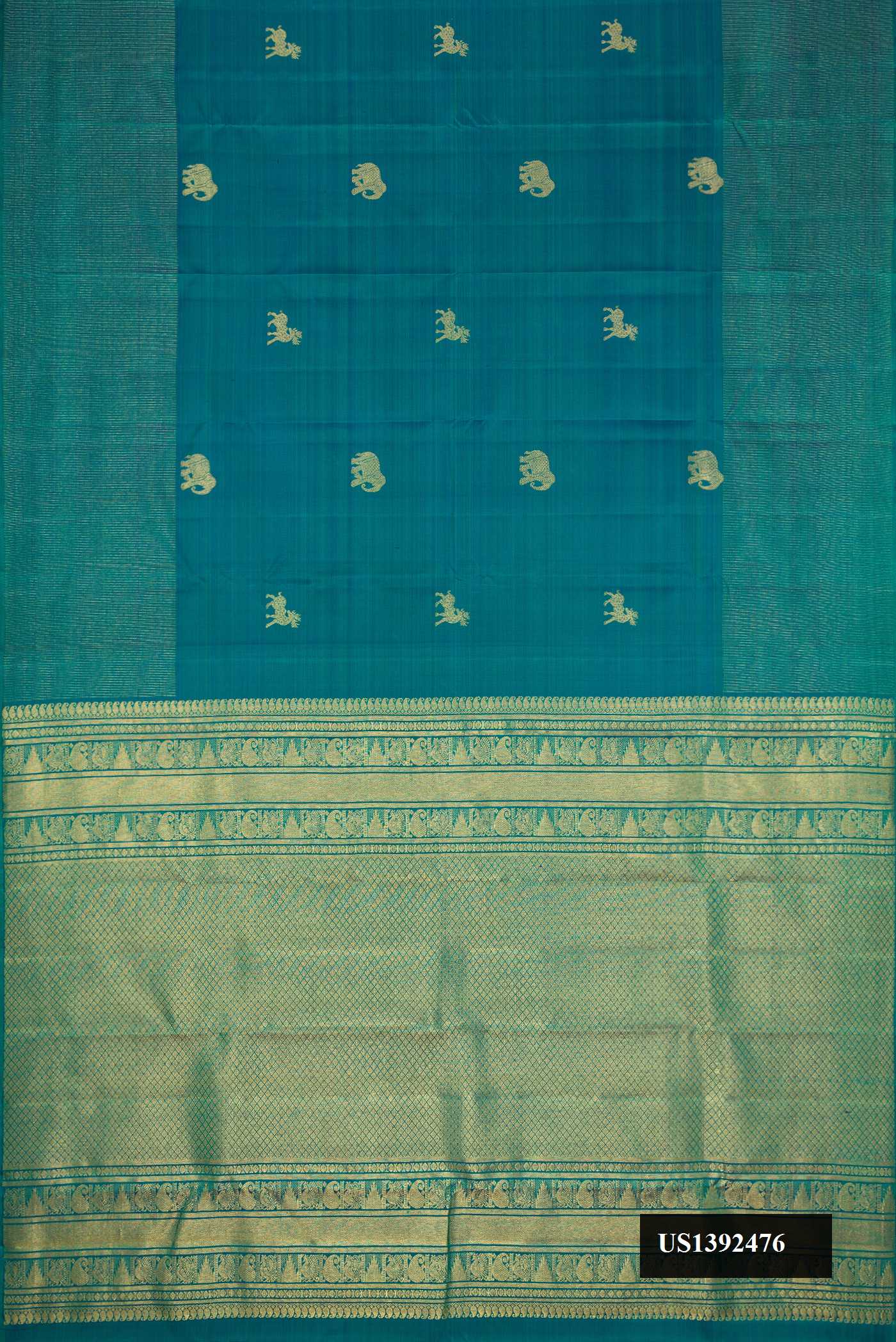 Peacock Blue Dual Tone Kanchipuram Silk Saree with Zari Butta on the body and Zari Border.  displayed on a mannequin