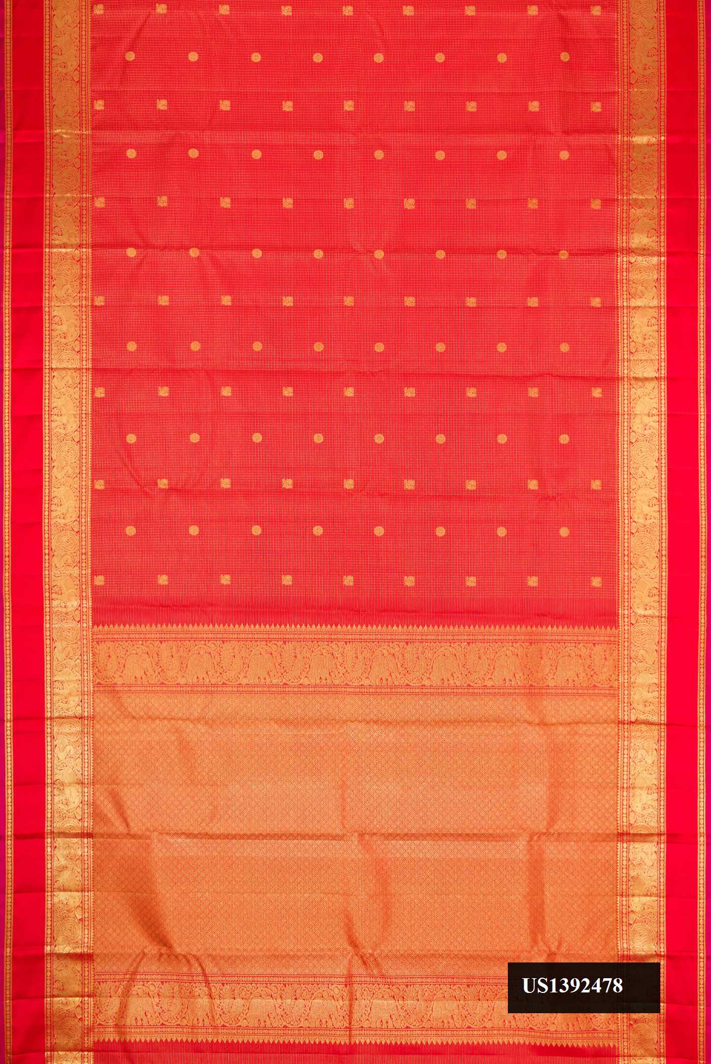 Brick Orange Dual Tone Kanchipuram Silk Saree with Zari Butta on the body and Zari Border.  displayed on a mannequin