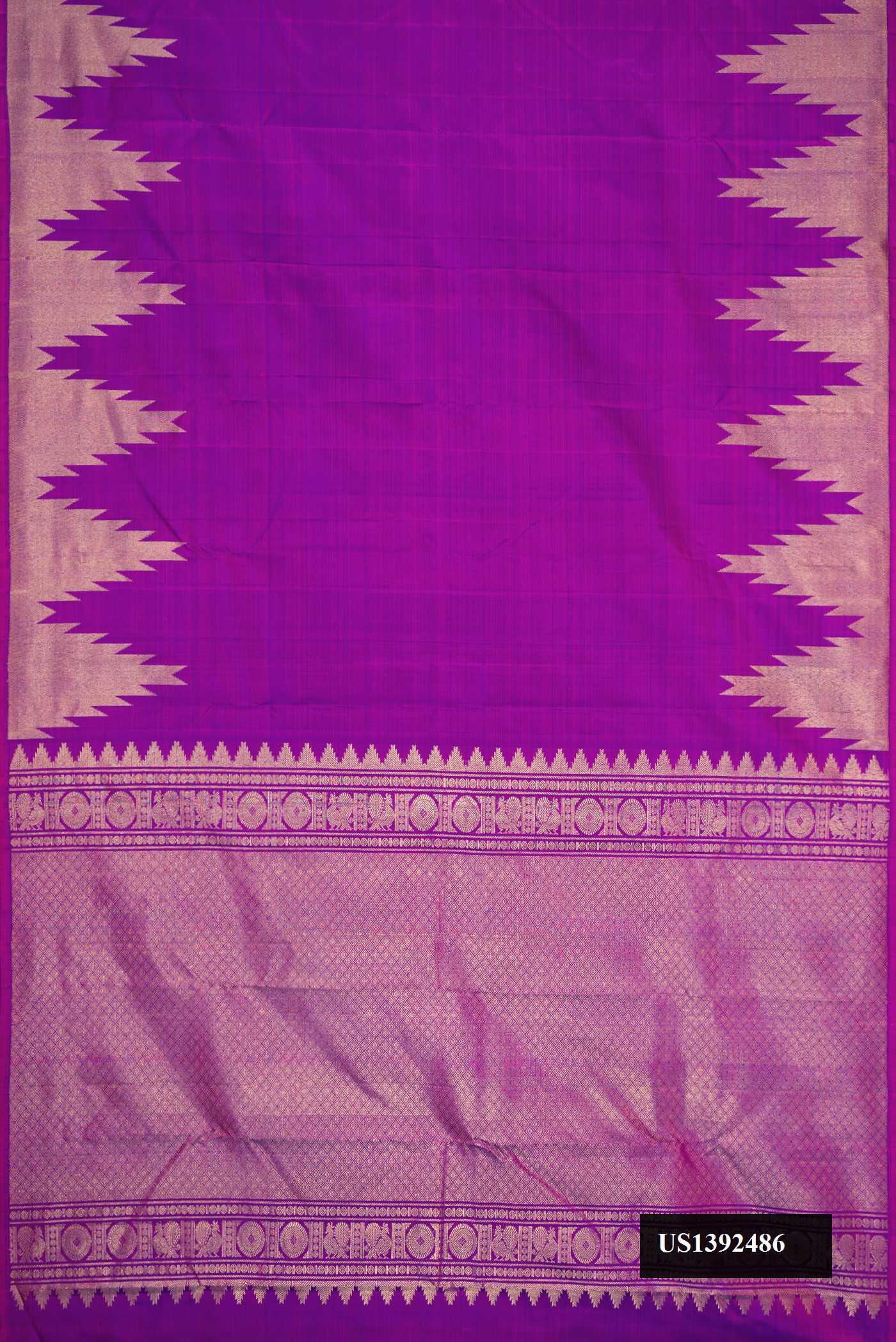 Magenta Dual Tone Kanchipuram Silk Saree with Plain Body and Temple Border.  displayed on a mannequin