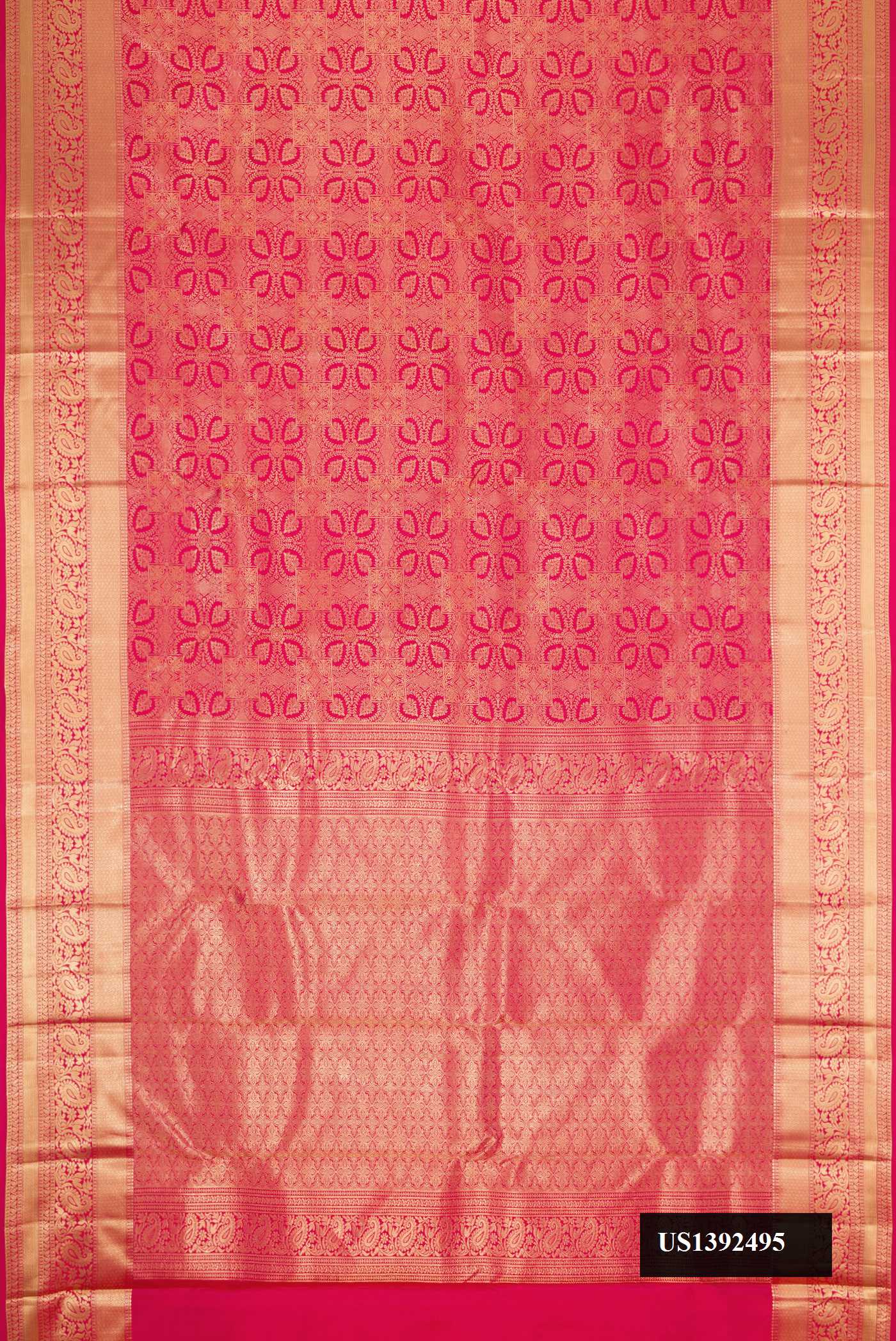 Dark Pink Dual Tone Kanchipuram Silk Saree with Zari Brocade on the body and Zari Border.  displayed on a mannequin