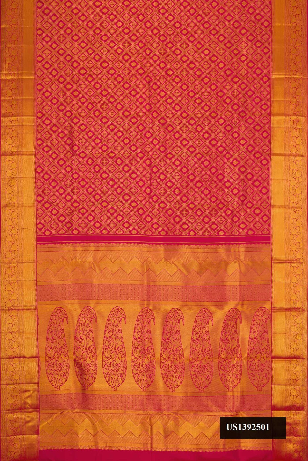 Red Dual Tone Kanchipuram Silk Saree with Zari Brocade on the body and Zari Border.  displayed on a mannequin