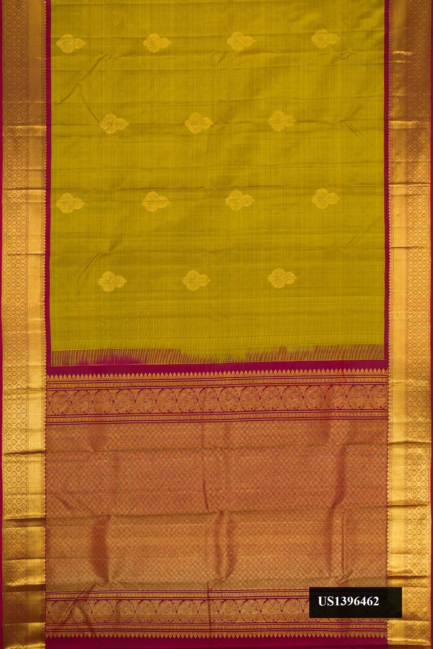 Mehandi Green Dual Tone Kanchipuram Silk Saree with Zari Butta on the body and Zari Border.  displayed on a mannequin