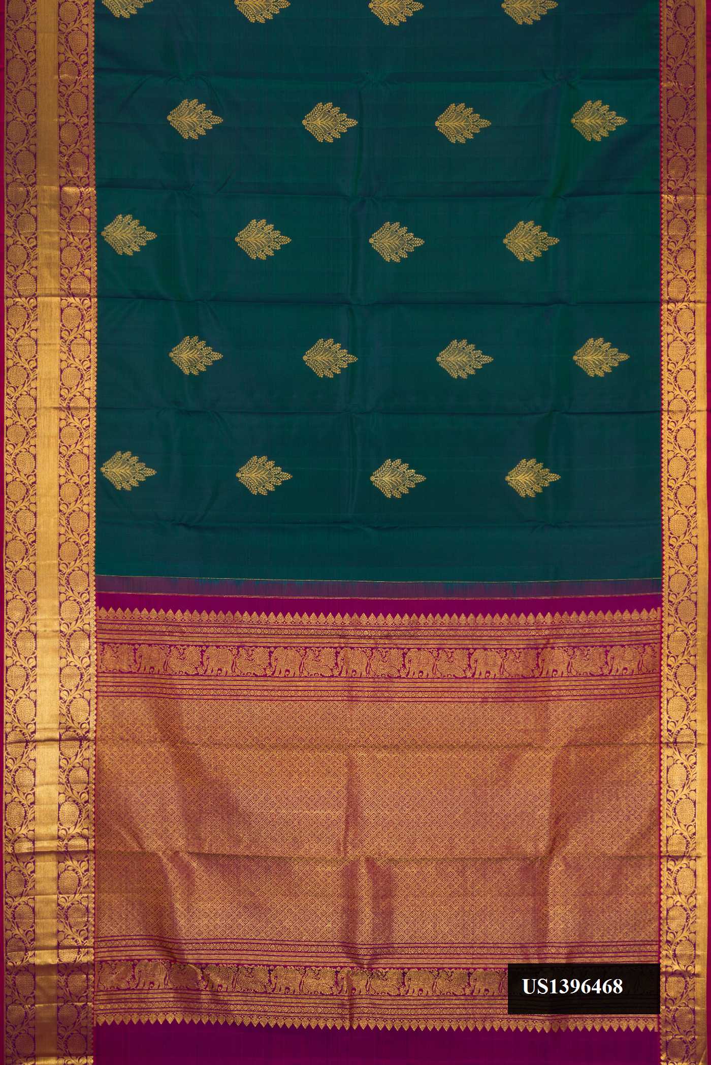 Bottle Green Dual Tone Kanchipuram Silk Saree with Zari Butta on the body and Zari Border.  displayed on a mannequin