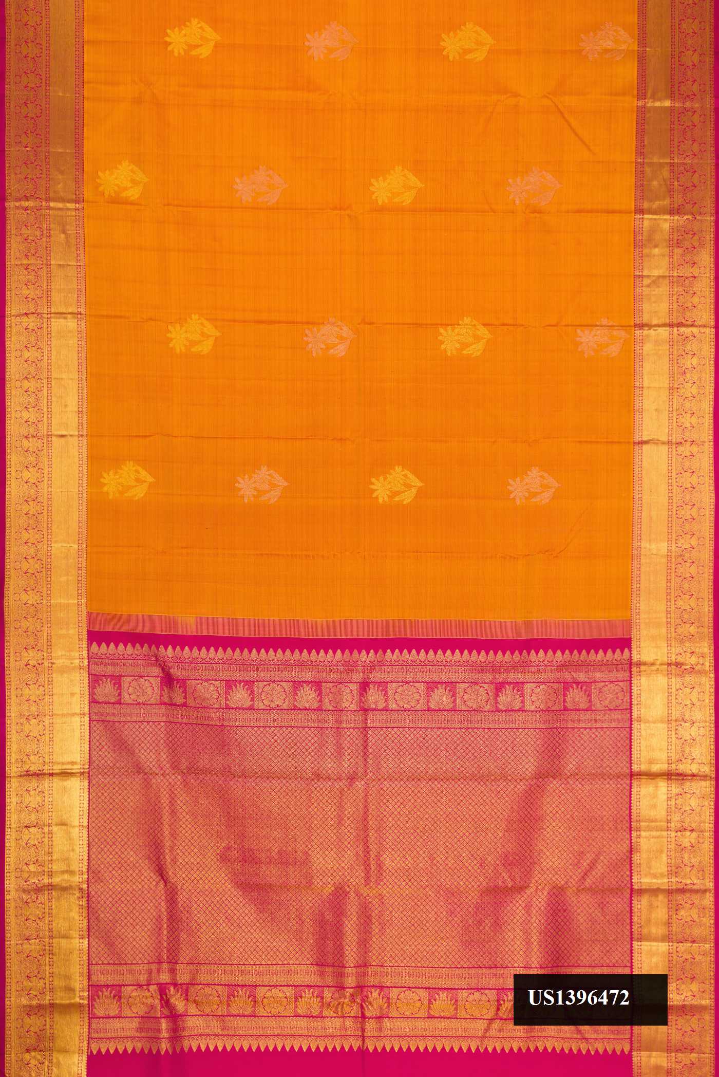 Mustard Dual Tone Kanchipuram Silk Saree with Zari Butta on the body and Zari Border.  displayed on a mannequin