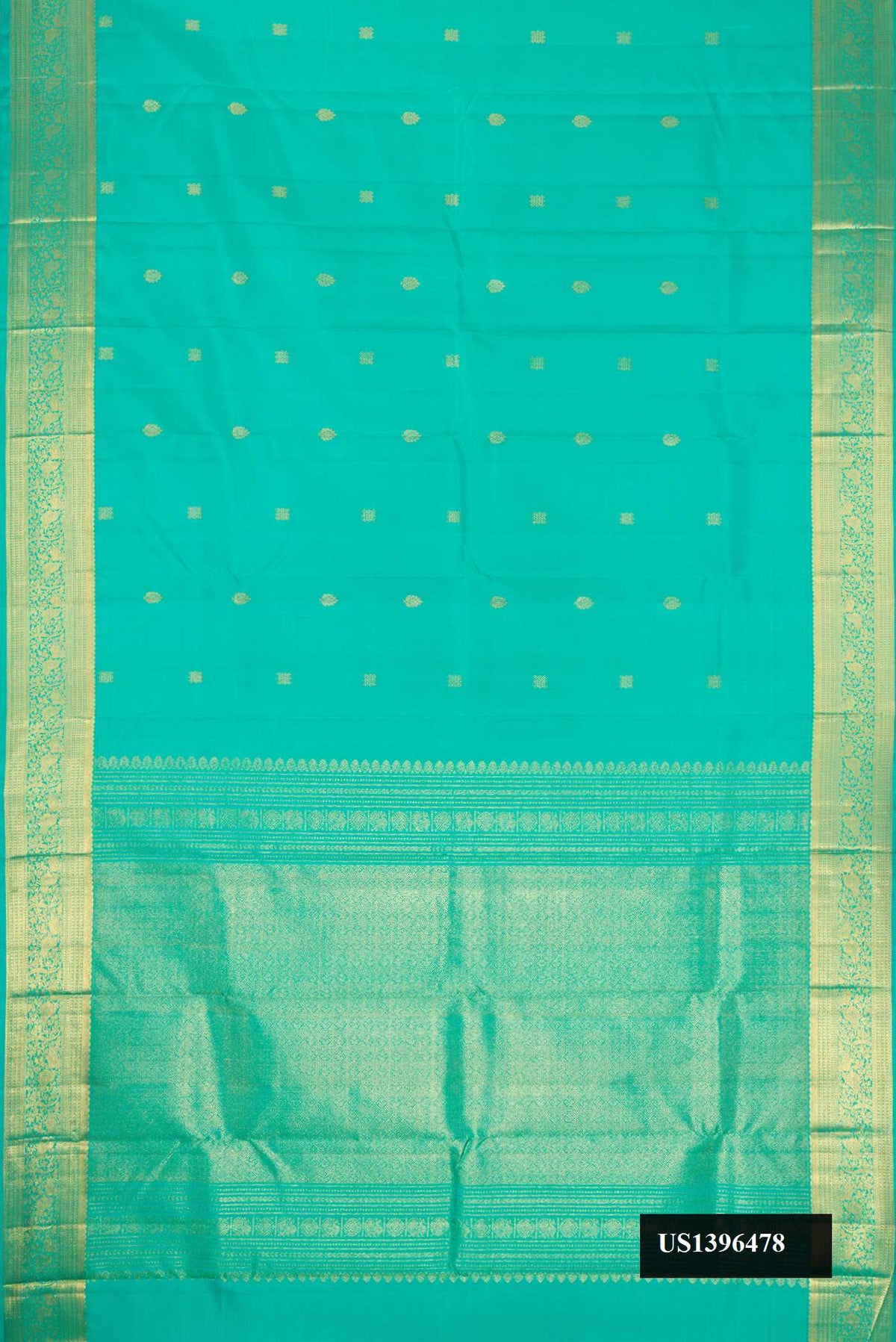 Sea Green Dual Tone Kanchipuram Silk Saree with Zari Butta on the body and Zari Border.  displayed on a mannequin