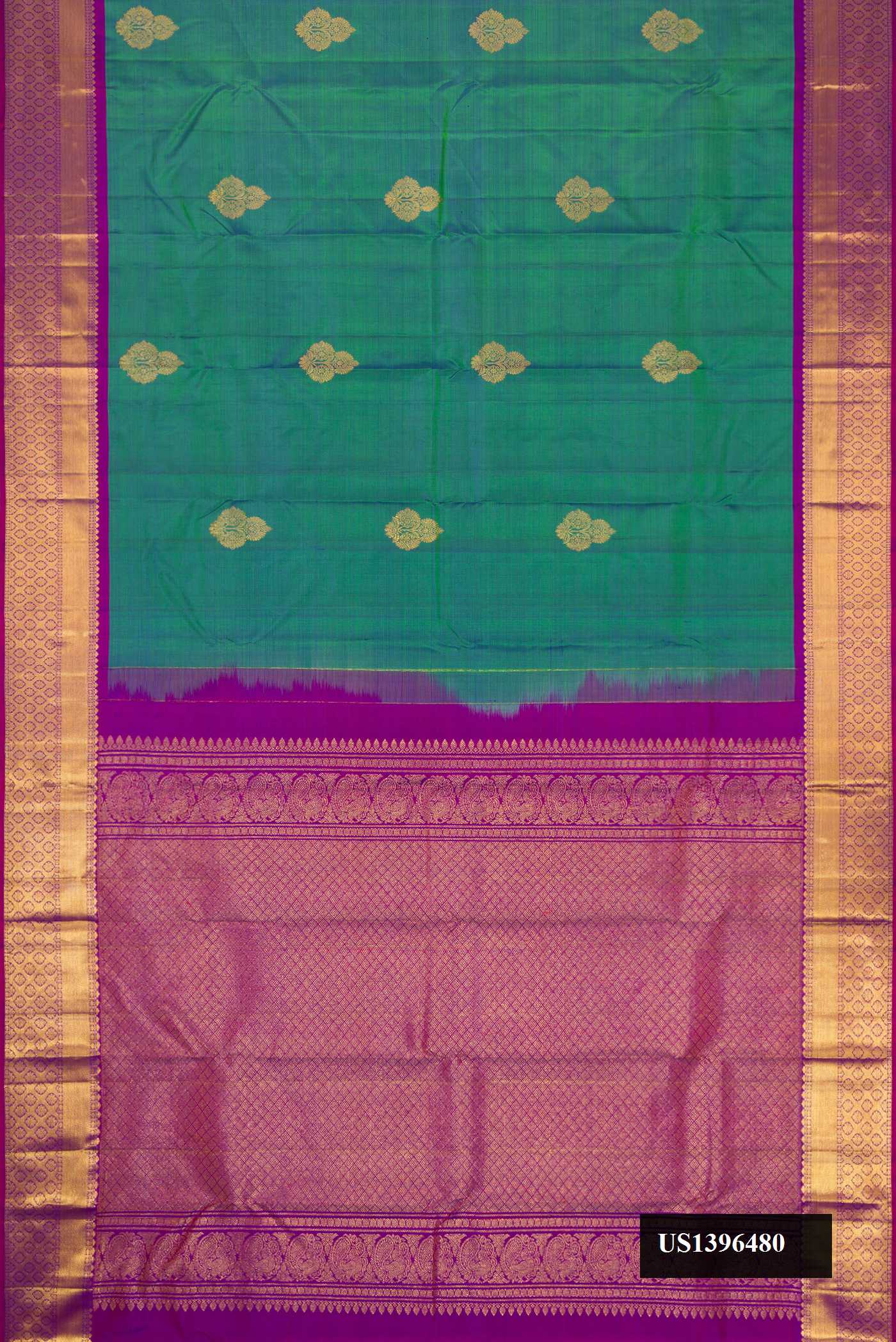 Green Dual Tone Kanchipuram Silk Saree with Zari Butta on the body and Zari Border.  displayed on a mannequin