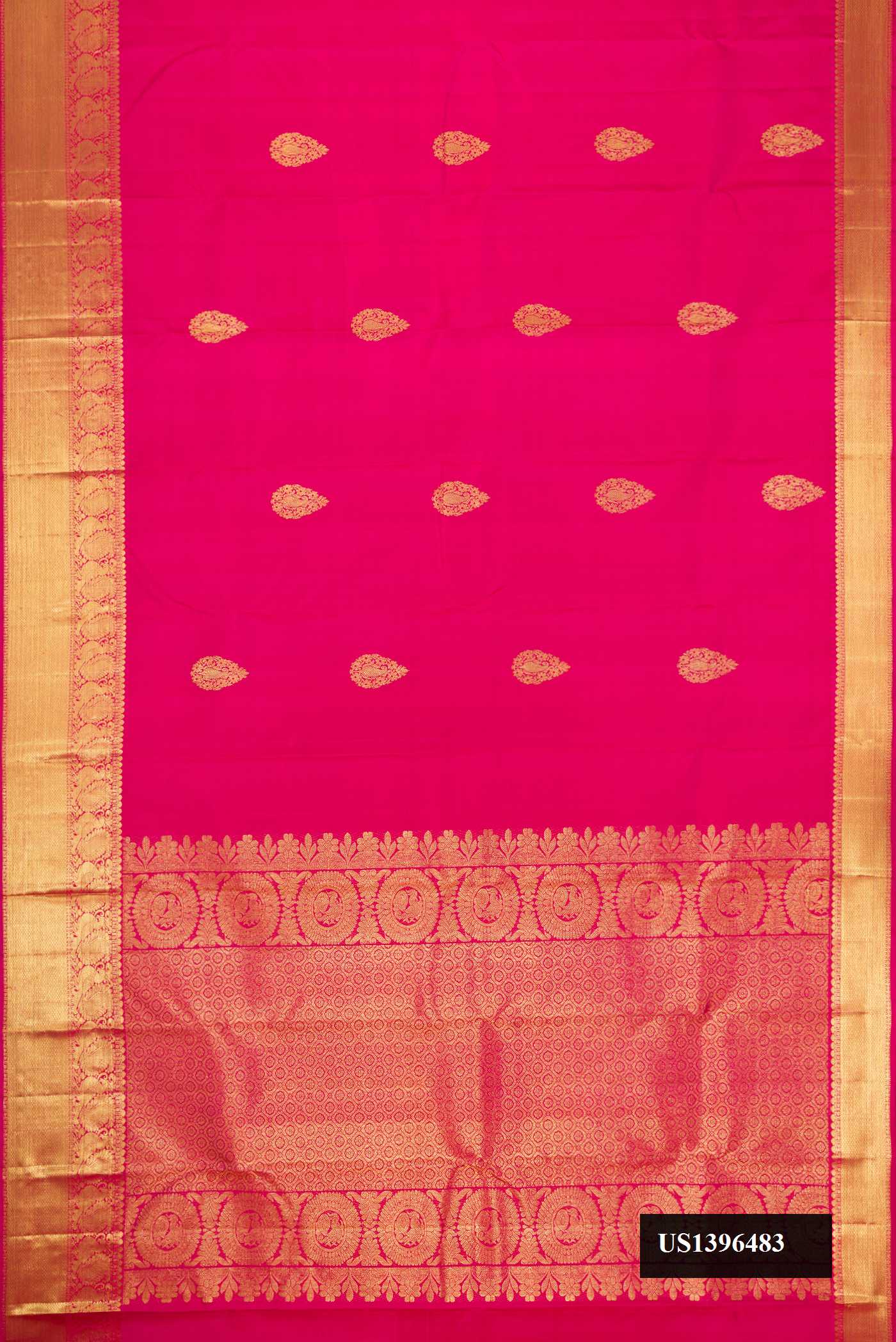 Pink Dual Tone Kanchipuram Silk Saree with Zari Butta on the body and Zari Border.  displayed on a mannequin