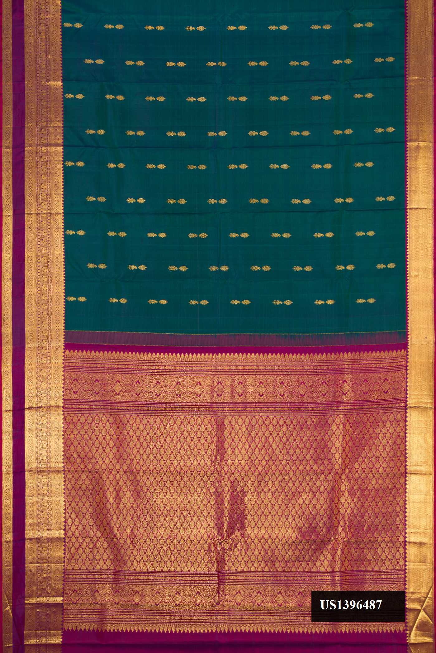 Bottle Green Dual Tone Kanchipuram Silk Saree with Zari Butta on the body and Zari Border.  displayed on a mannequin