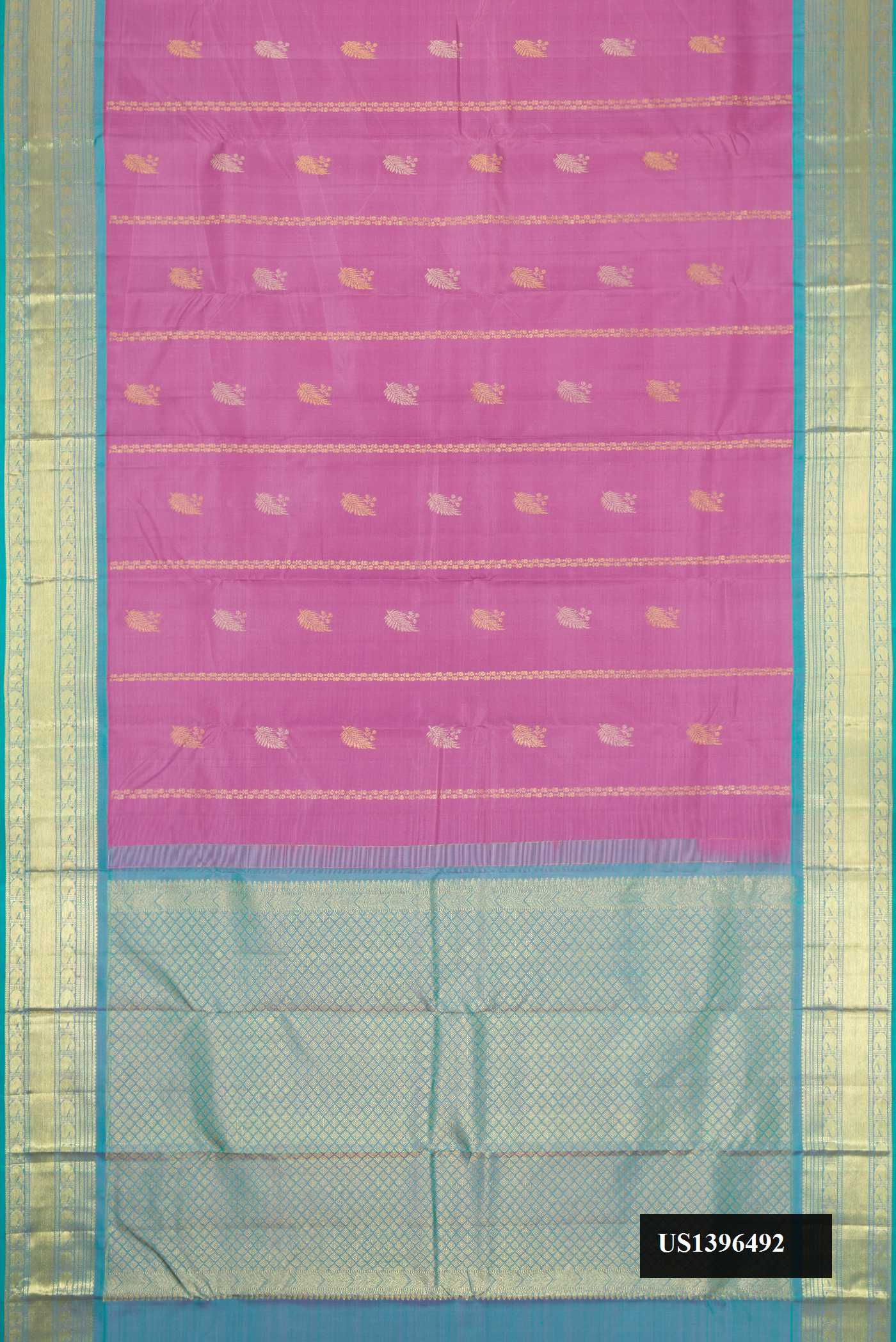 Pink Dual Tone Kanchipuram Silk Saree with Zari Butta on the body and Zari Border.  displayed on a mannequin