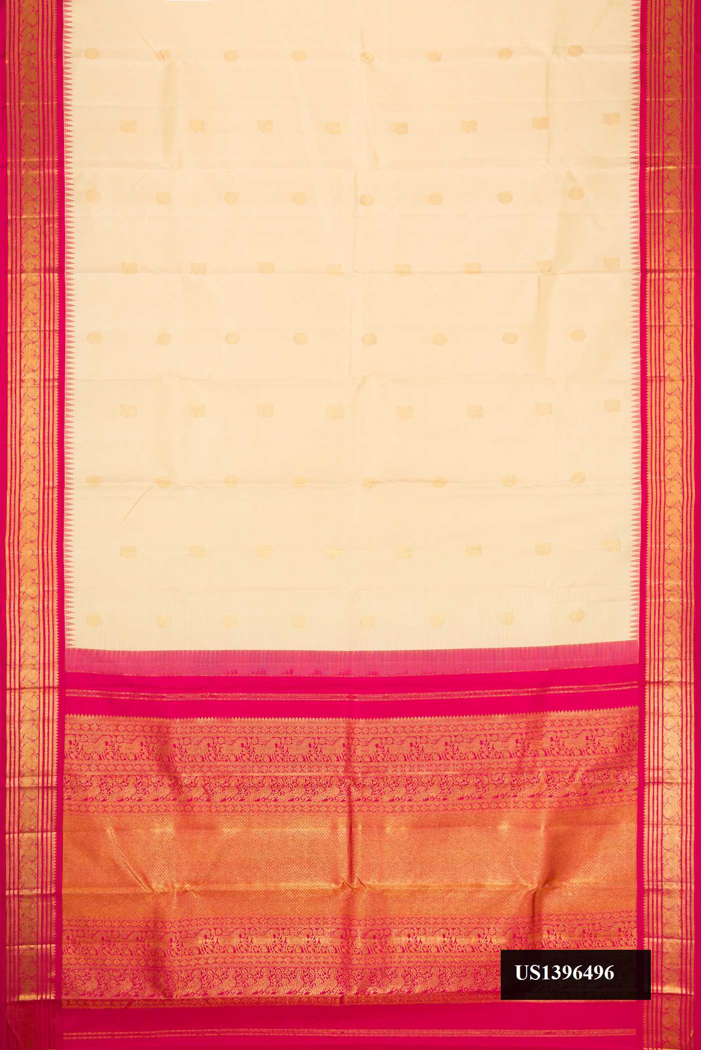 Sandal Dual Tone Kanchipuram Silk Saree with Zari Butta on the body and Zari Border.  displayed on a mannequin
