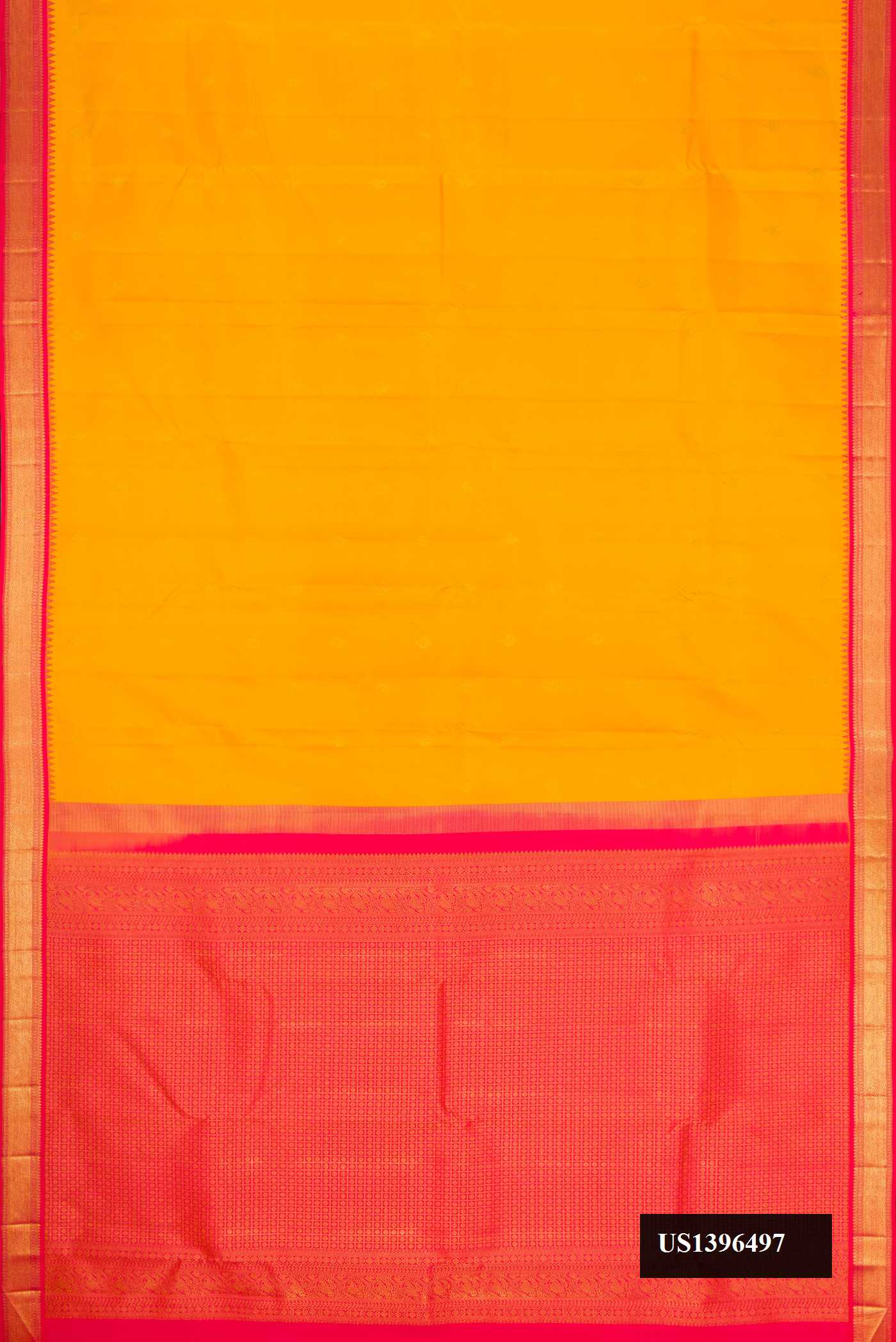 Yellow Dual Tone Kanchipuram Silk Saree with Zari Butta on the body and Zari Border.  displayed on a mannequin