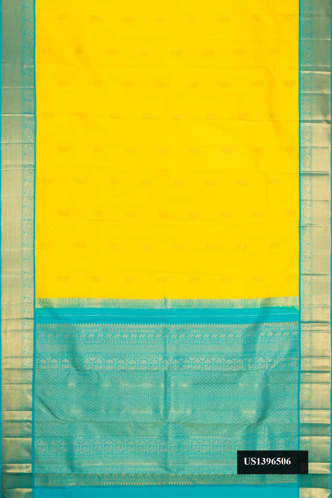 Yellow Dual Tone Kanchipuram Silk Saree with Zari Butta on the body and Zari Border.  displayed on a mannequin