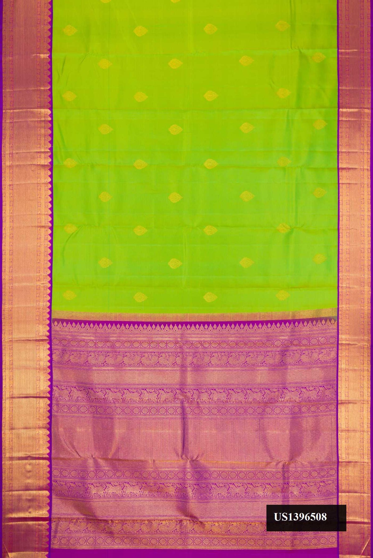 Parrot Green Dual Tone Kanchipuram Silk Saree with Zari Butta on the body and Zari Border.  displayed on a mannequin