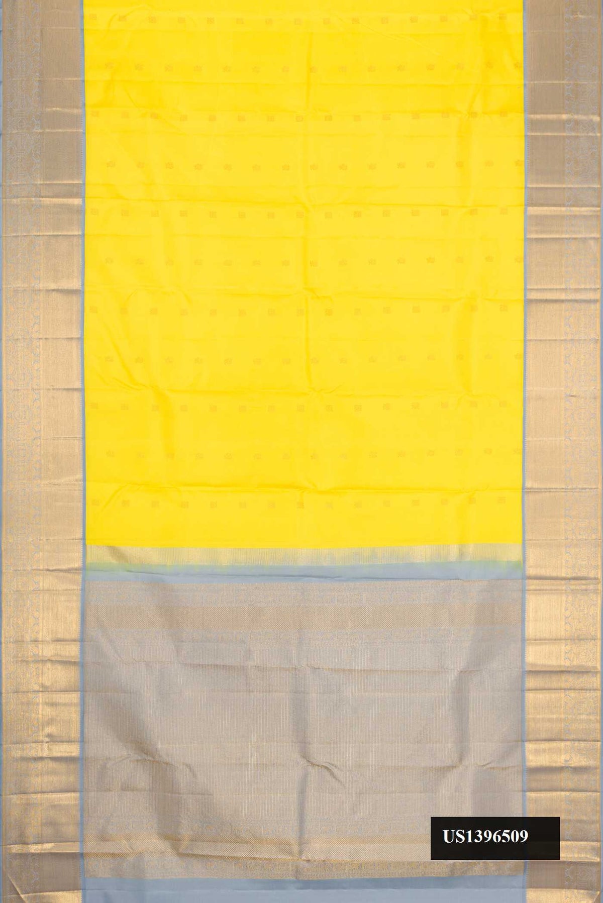 Yellow Dual Tone Kanchipuram Silk Saree with Zari Butta on the body and Zari Border.  displayed on a mannequin