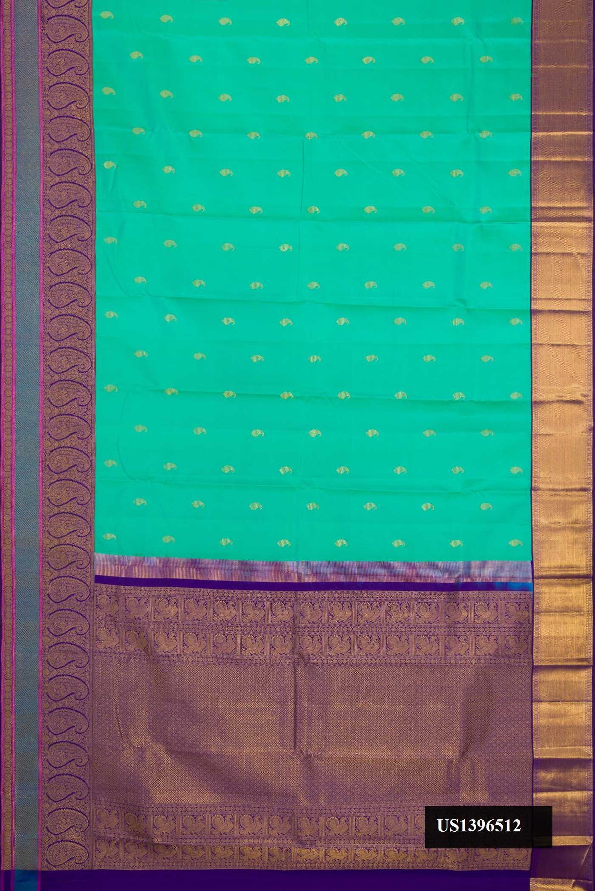 Sea Green Dual Tone Kanchipuram Silk Saree with Zari Butta on the body and Zari Border.  displayed on a mannequin