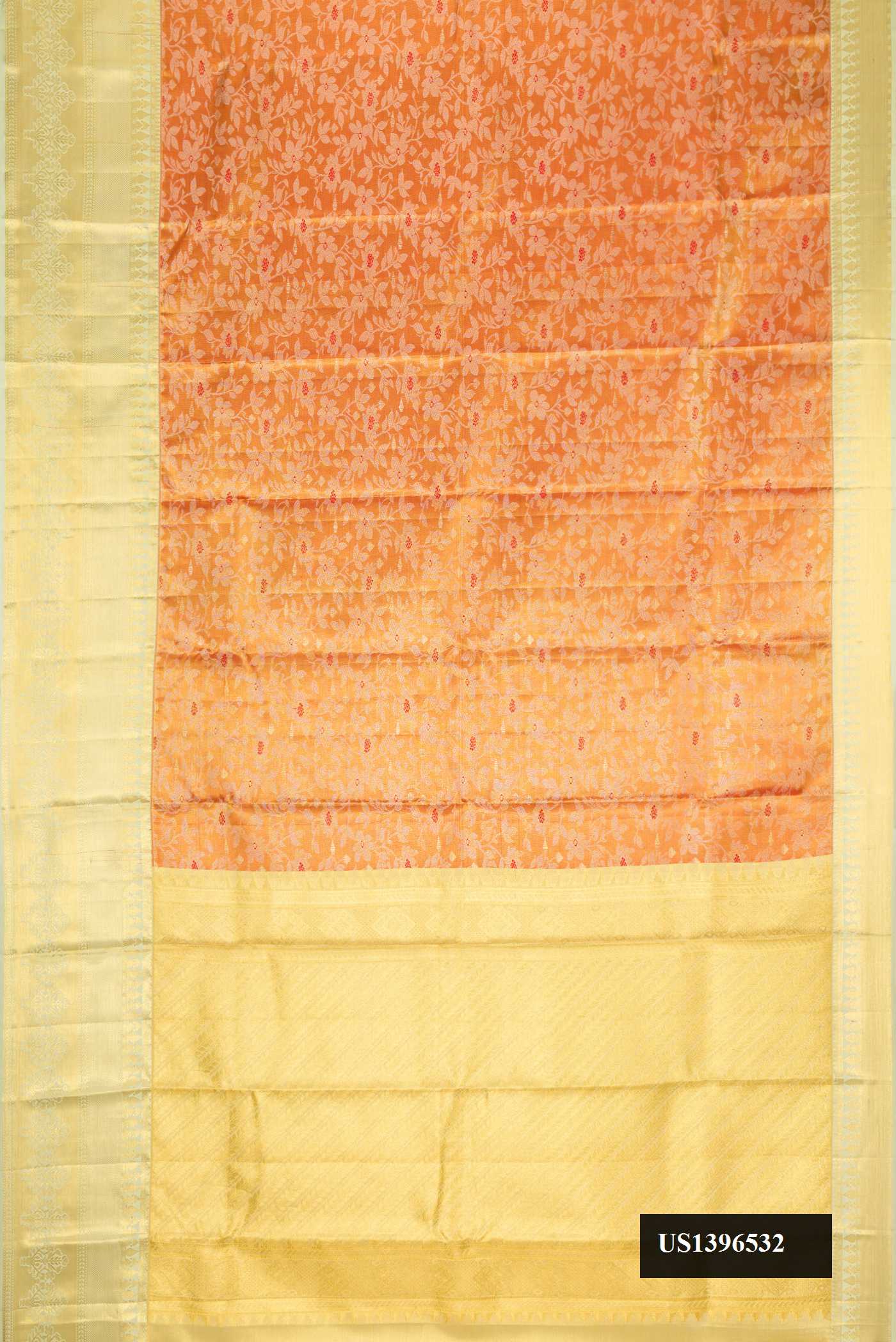 Red Dual Tone Kanchipuram Tissue Silk Saree with Zari Brocade on the body and Zari Border.  displayed on a mannequin