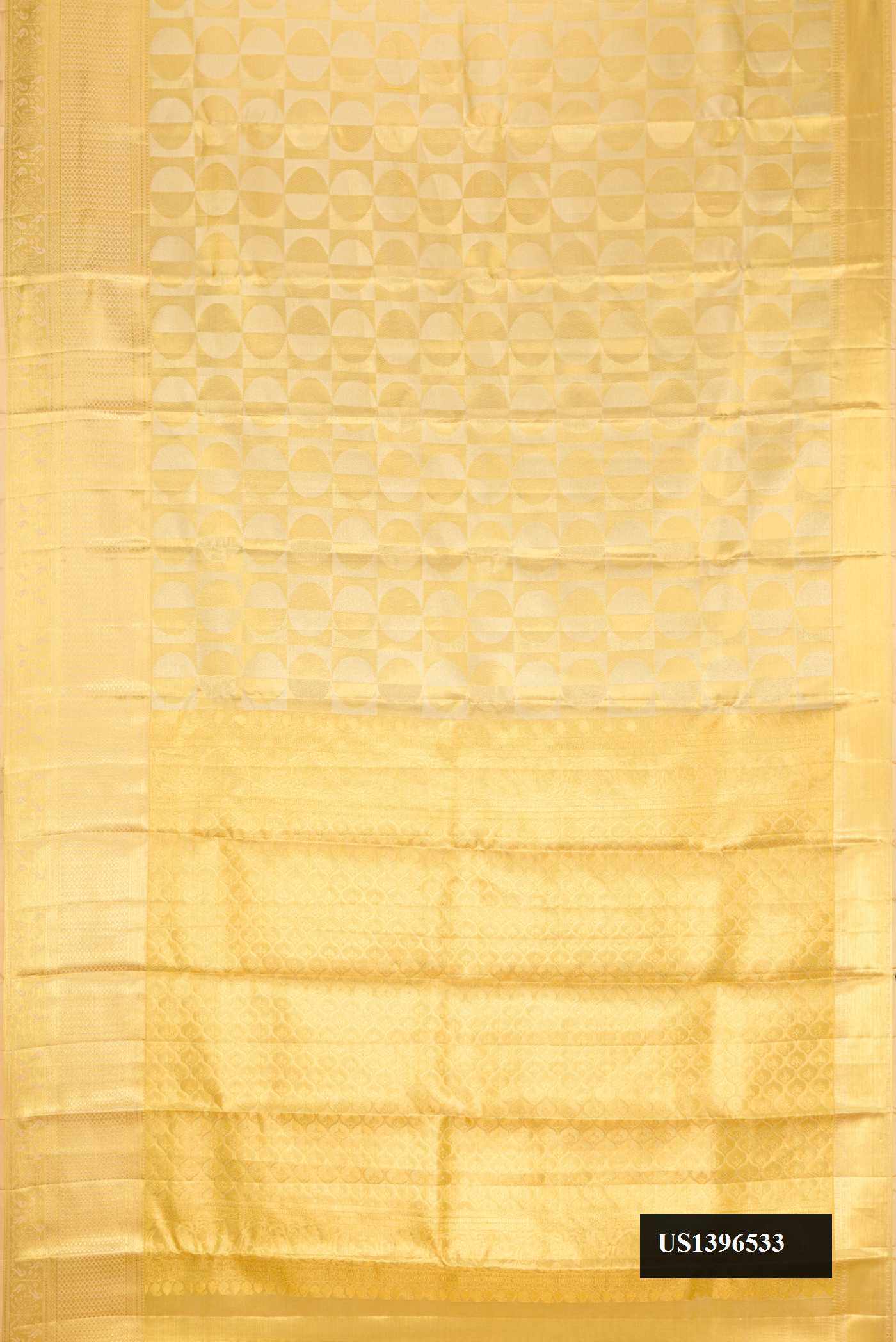 Gold Dual Tone Kanchipuram Tissue Silk Saree with Zari Brocade on the body and Zari Border.  displayed on a mannequin