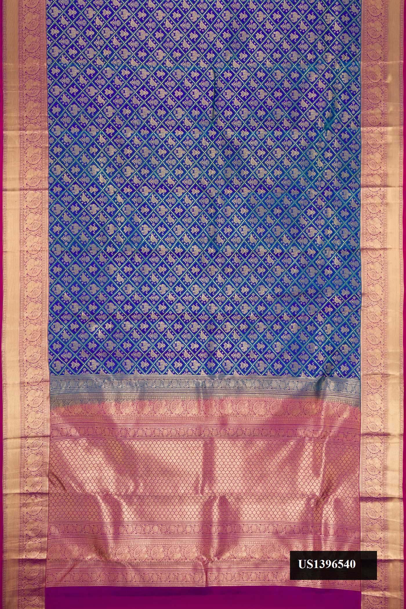 Royal Blue Dual Tone Kanchipuram Silk Saree with Zari Brocade on the body and Zari Border.  displayed on a mannequin