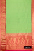 Parrot Green Dual Tone Kanchipuram Silk Saree with Zari Butta on the body and Zari Border.  displayed on a mannequin