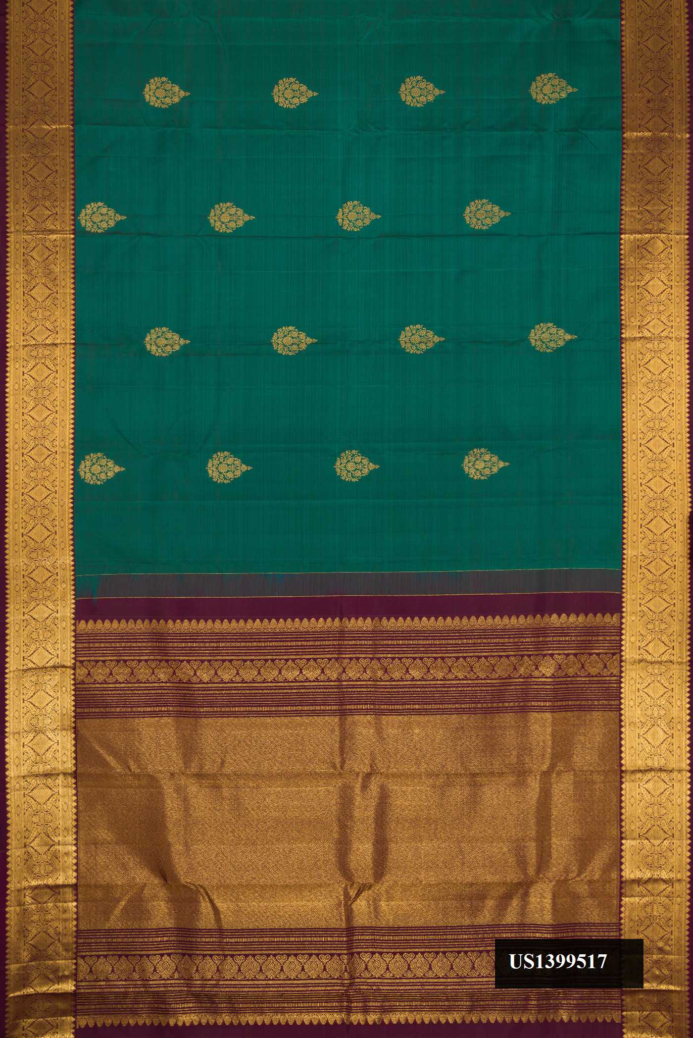 Bottle Green Dual Tone Kanchipuram Silk Saree with Zari Butta on the body and Zari Border.  displayed on a mannequin