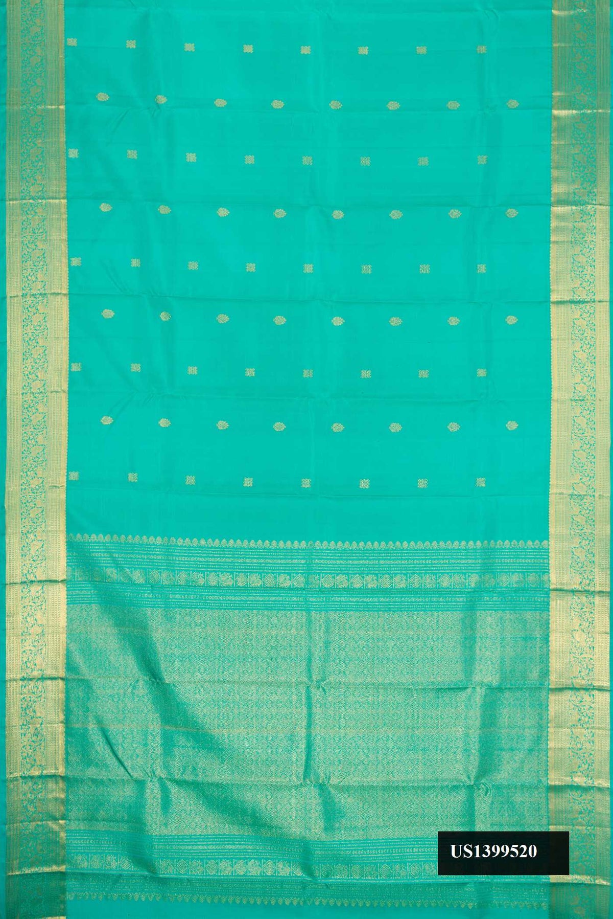 Sea Green Dual Tone Kanchipuram Silk Saree with Zari Butta on the body and Zari Border.  displayed on a mannequin