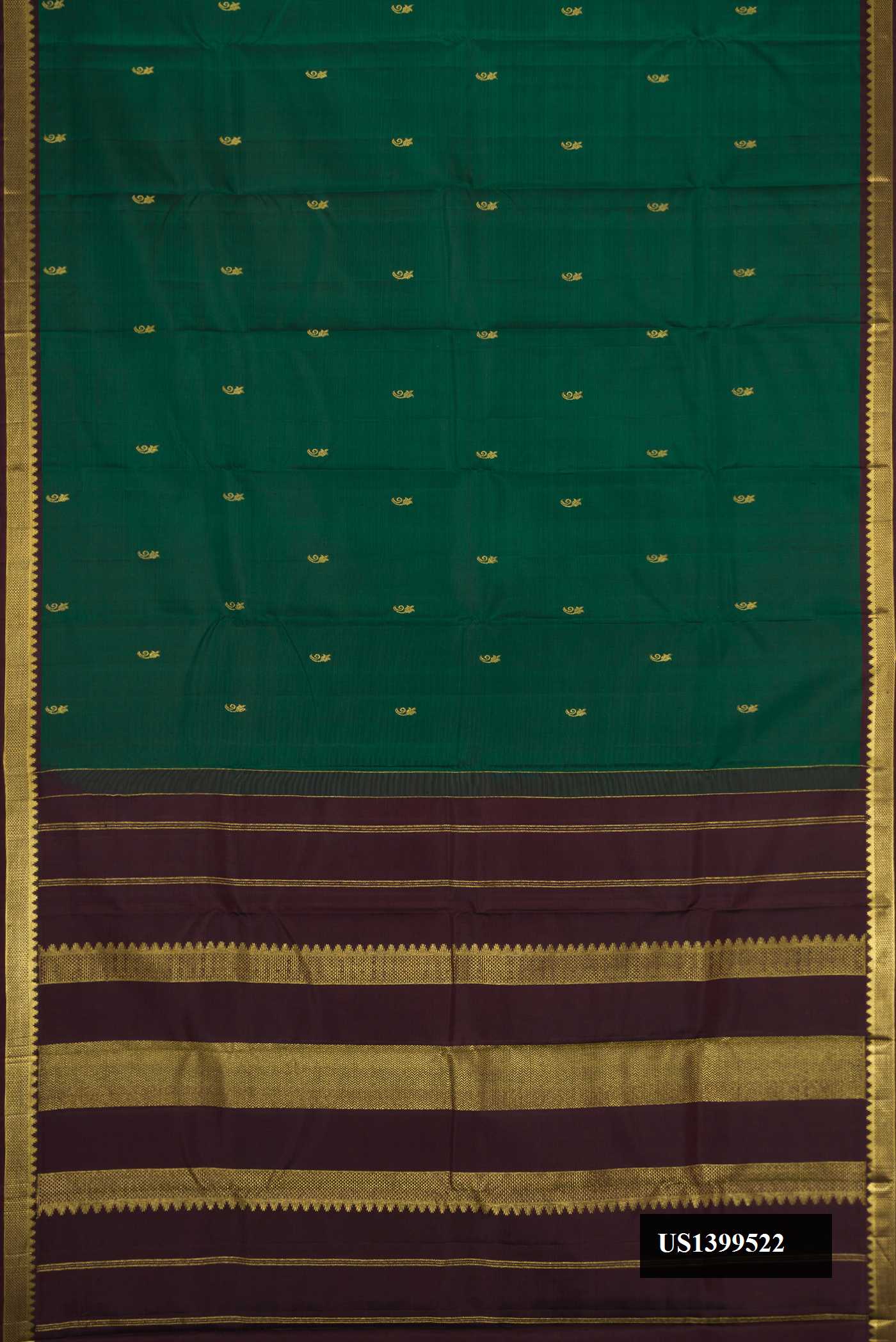 Bottle Green Dual Tone Kanchipuram Silk Saree with Zari Butta on the body and Zari Border.  displayed on a mannequin