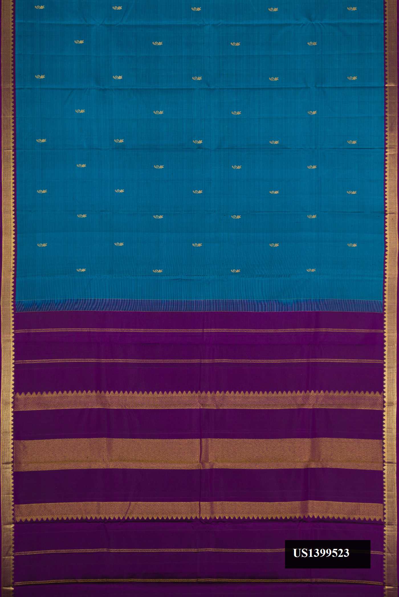 Peacock Blue Dual Tone Kanchipuram Silk Saree with Zari Butta on the body and Zari Border.  displayed on a mannequin