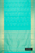 Light Blue Dual Tone Kanchipuram Silk Saree with Zari Butta on the body and Zari Border.  displayed on a mannequin